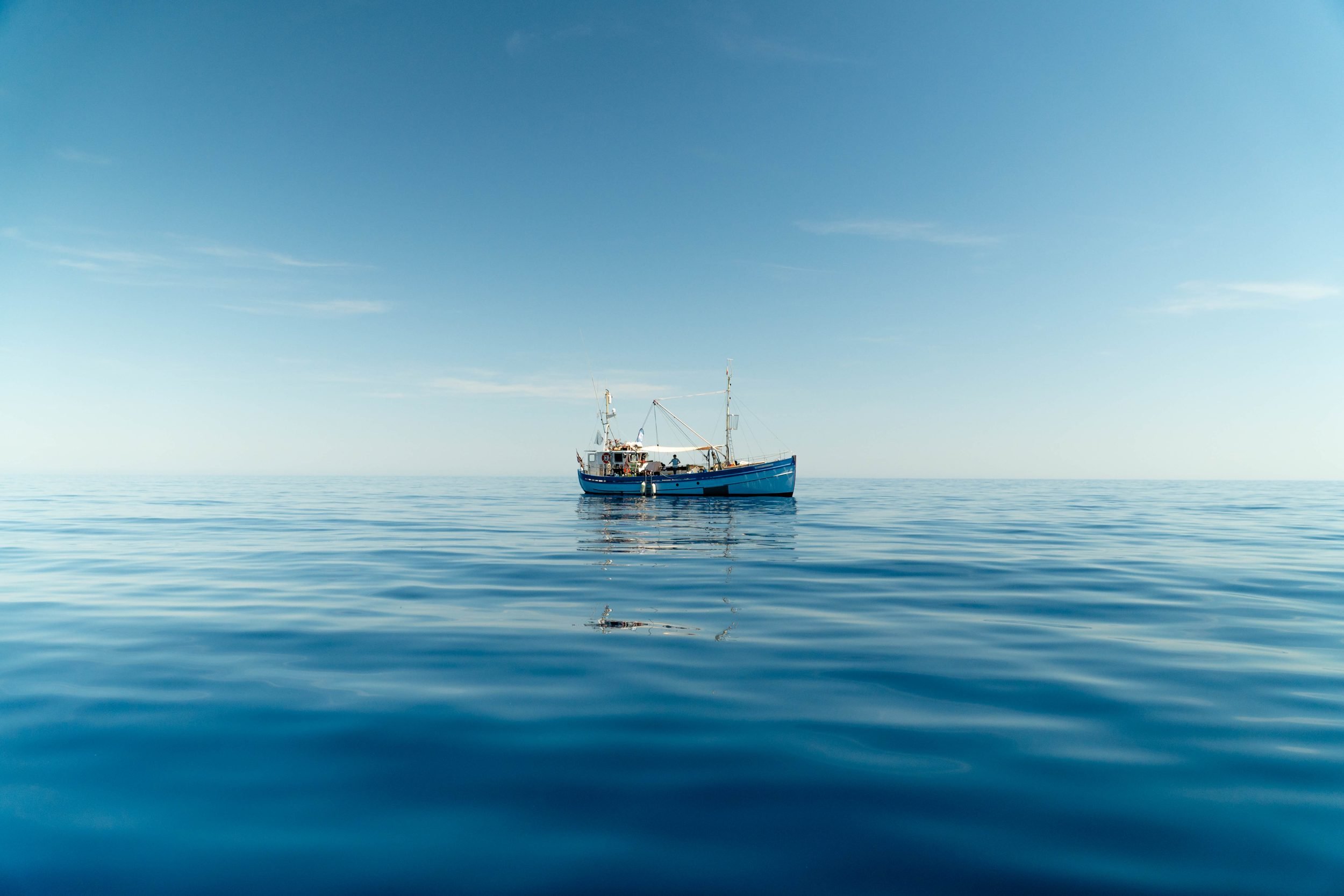 Bonnie Lass on glassy calm sea