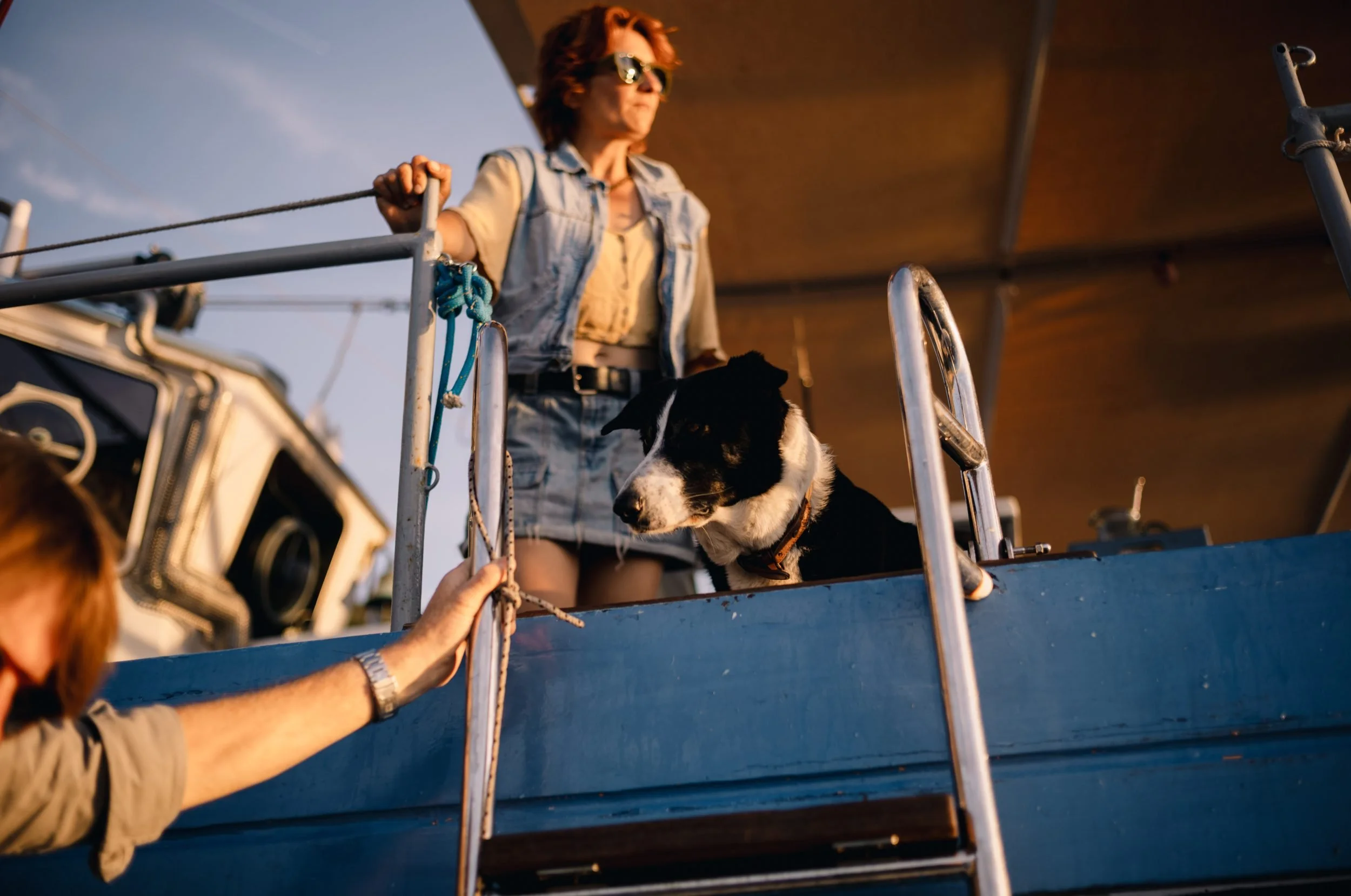 11-crew-and-ship-dog-welcoming-guests-aboard-bonnie-lass.jpg
