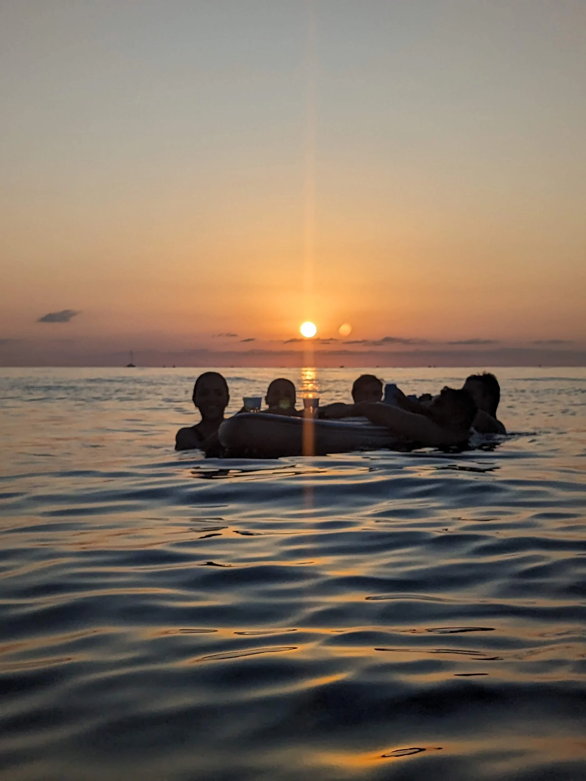 Paddleboarders at sunset Mallorca