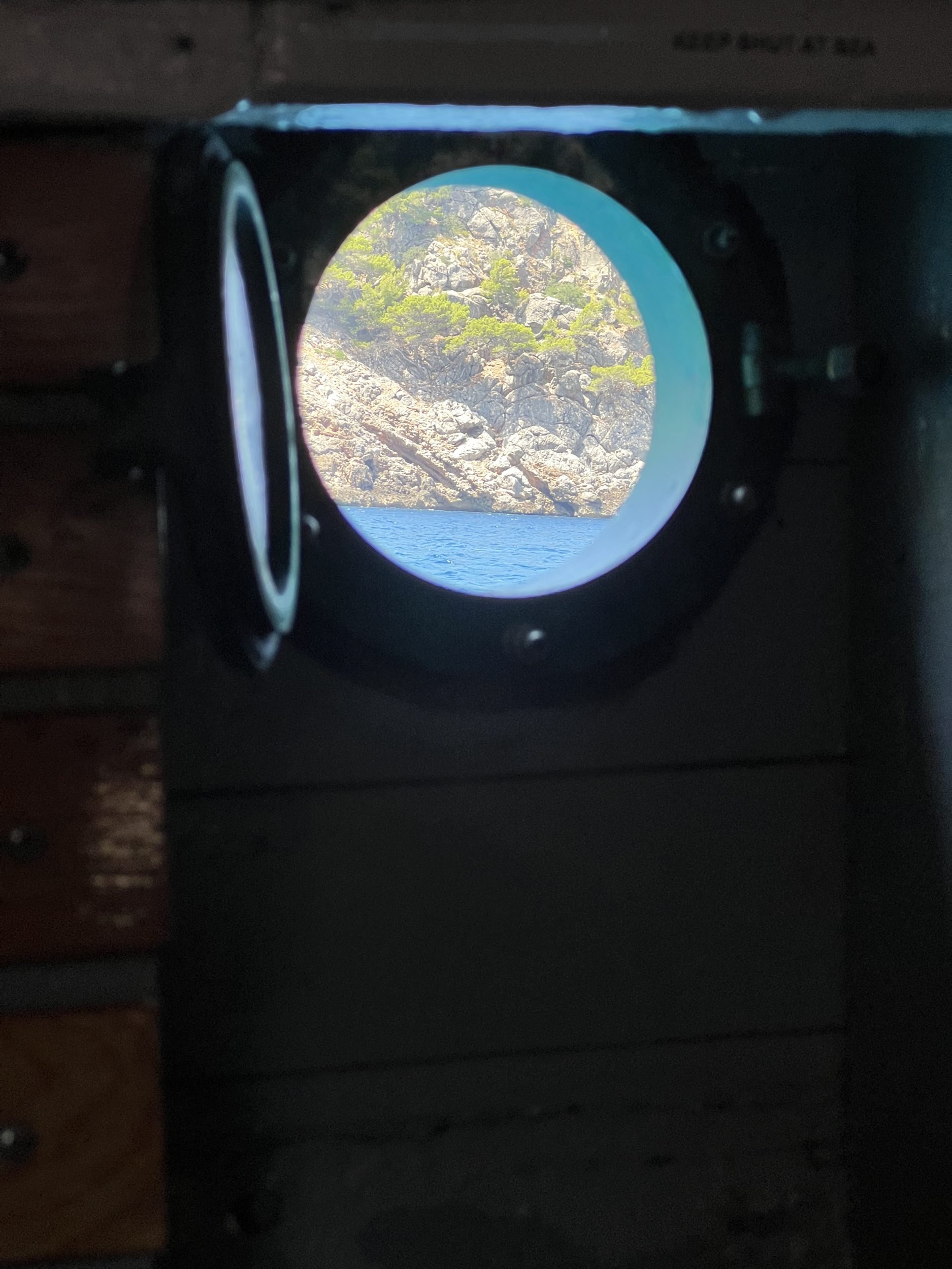 D73-porthole-view-of-tramuntana-coast.jpg