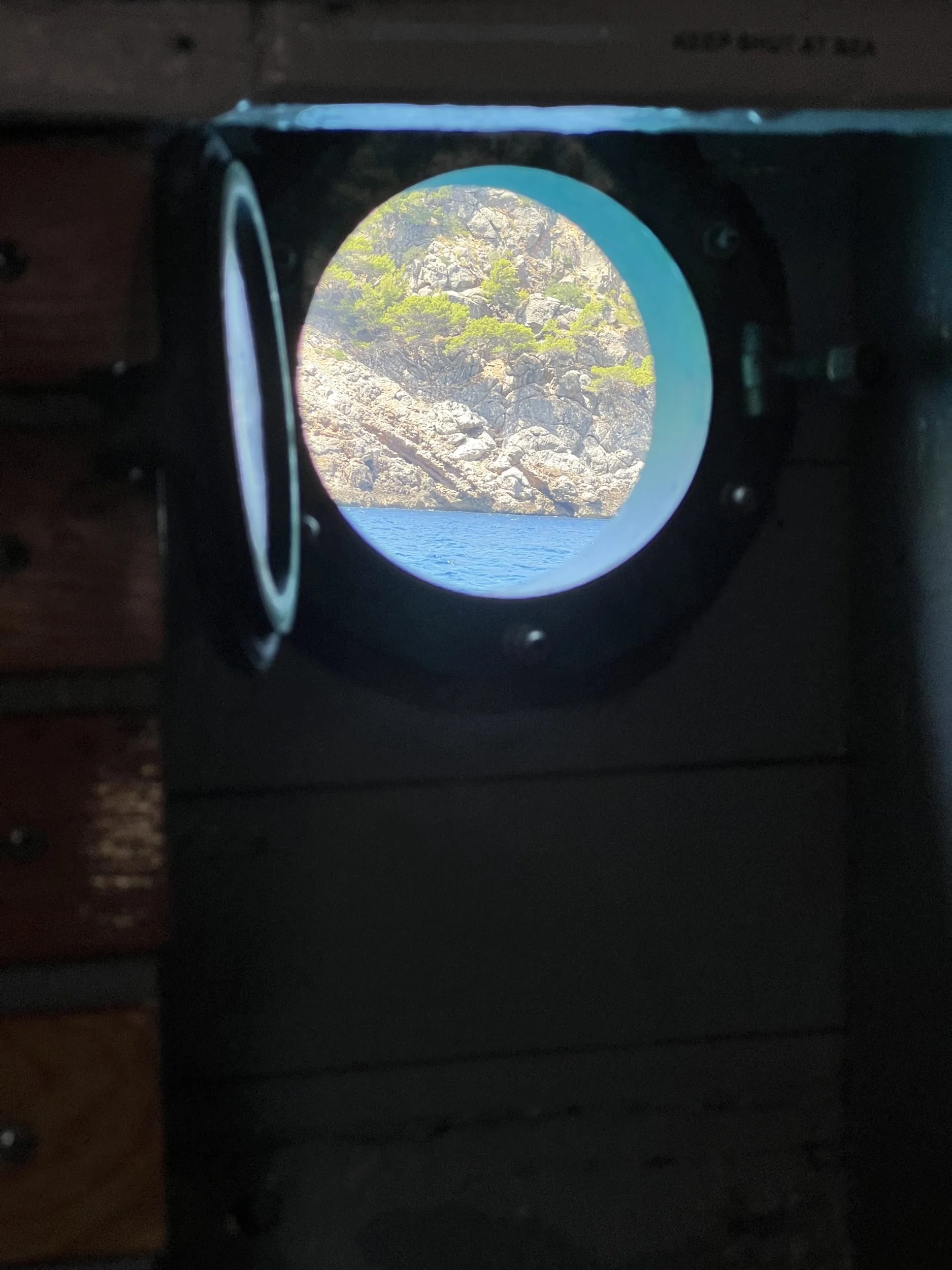 Porthole view of Tramuntana coast