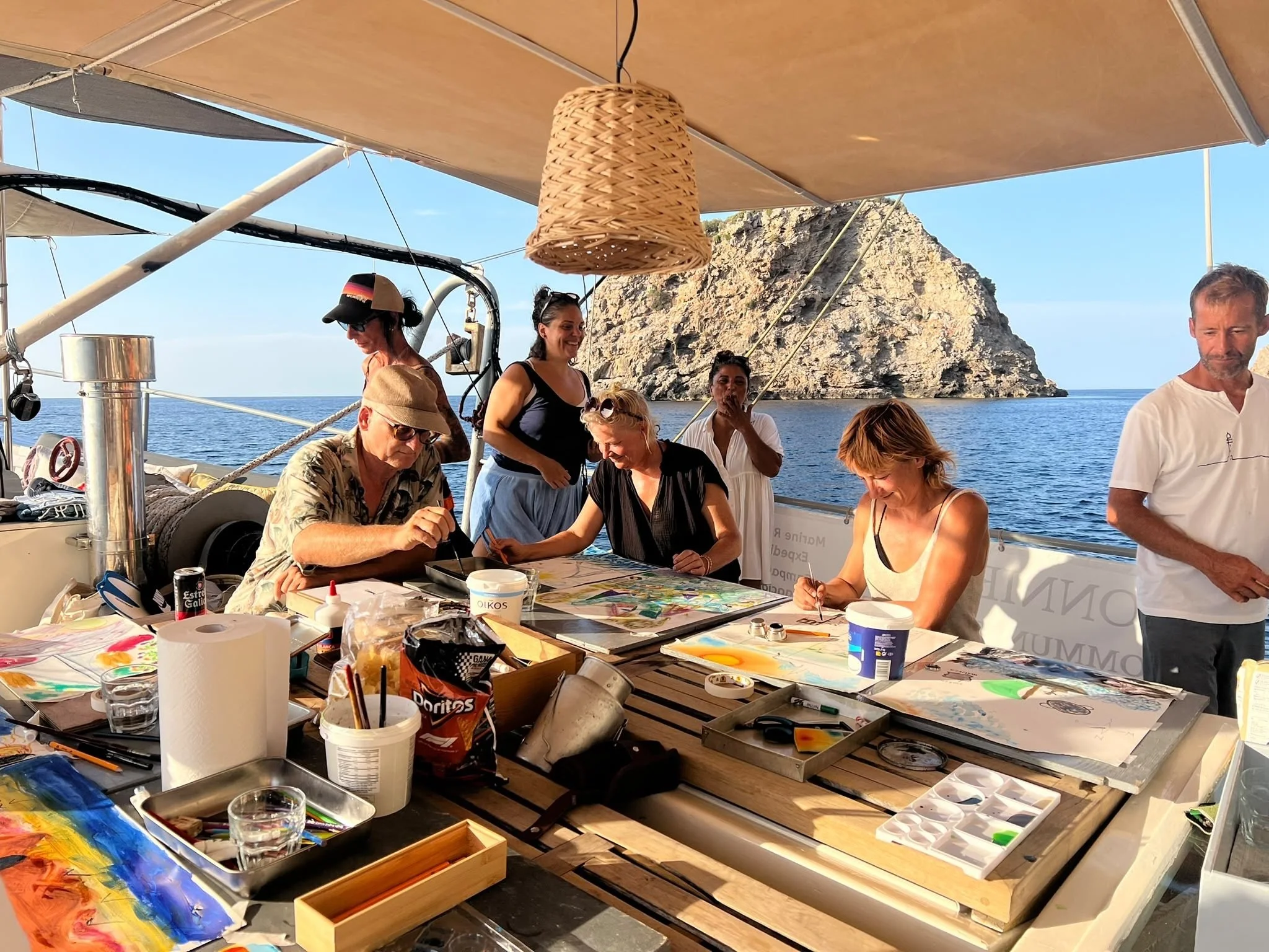 D57-sketch-at-sea-group-painting-on-deck.jpg
