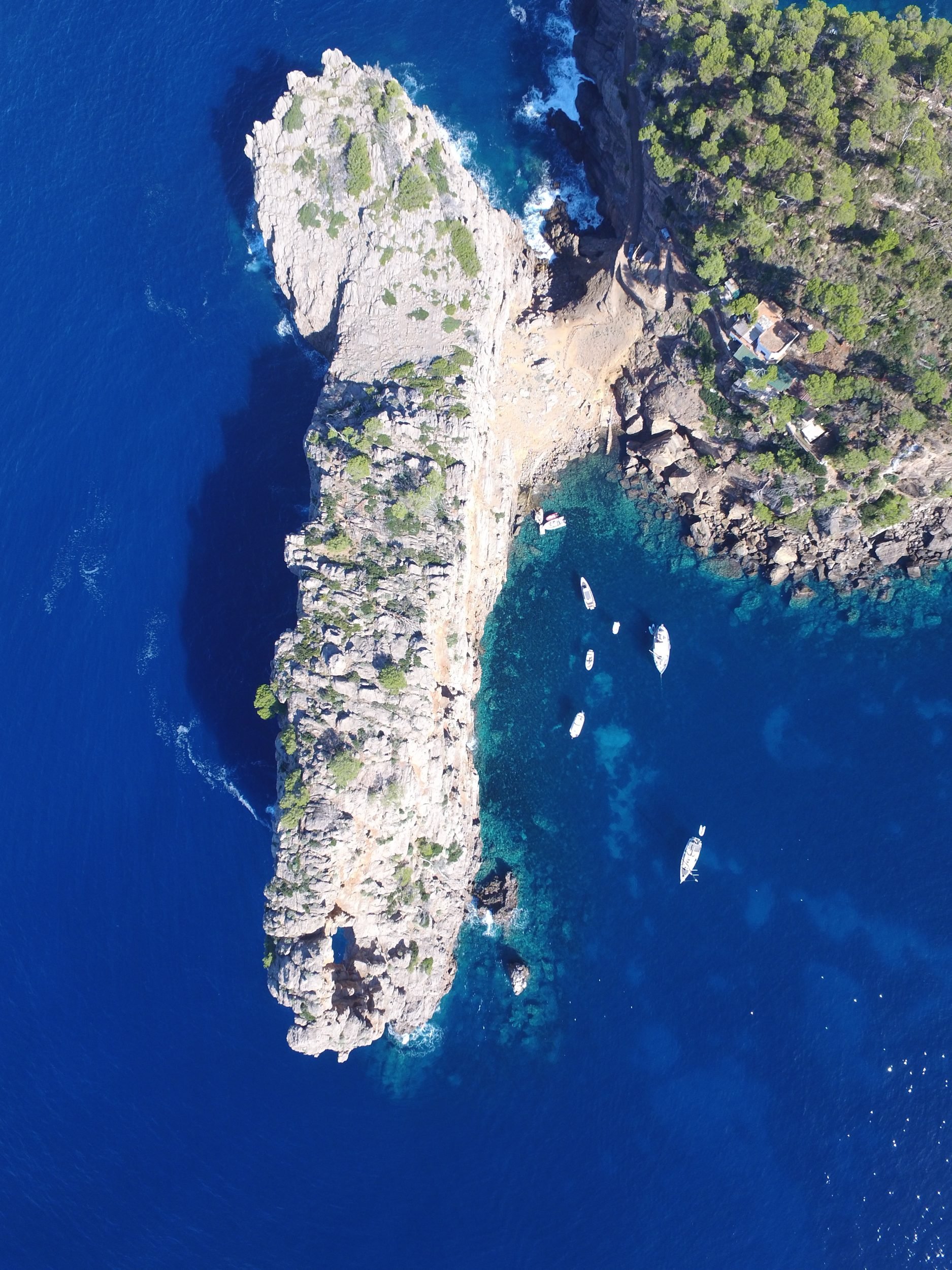 Aerial view Tramuntana headland turquoise sea