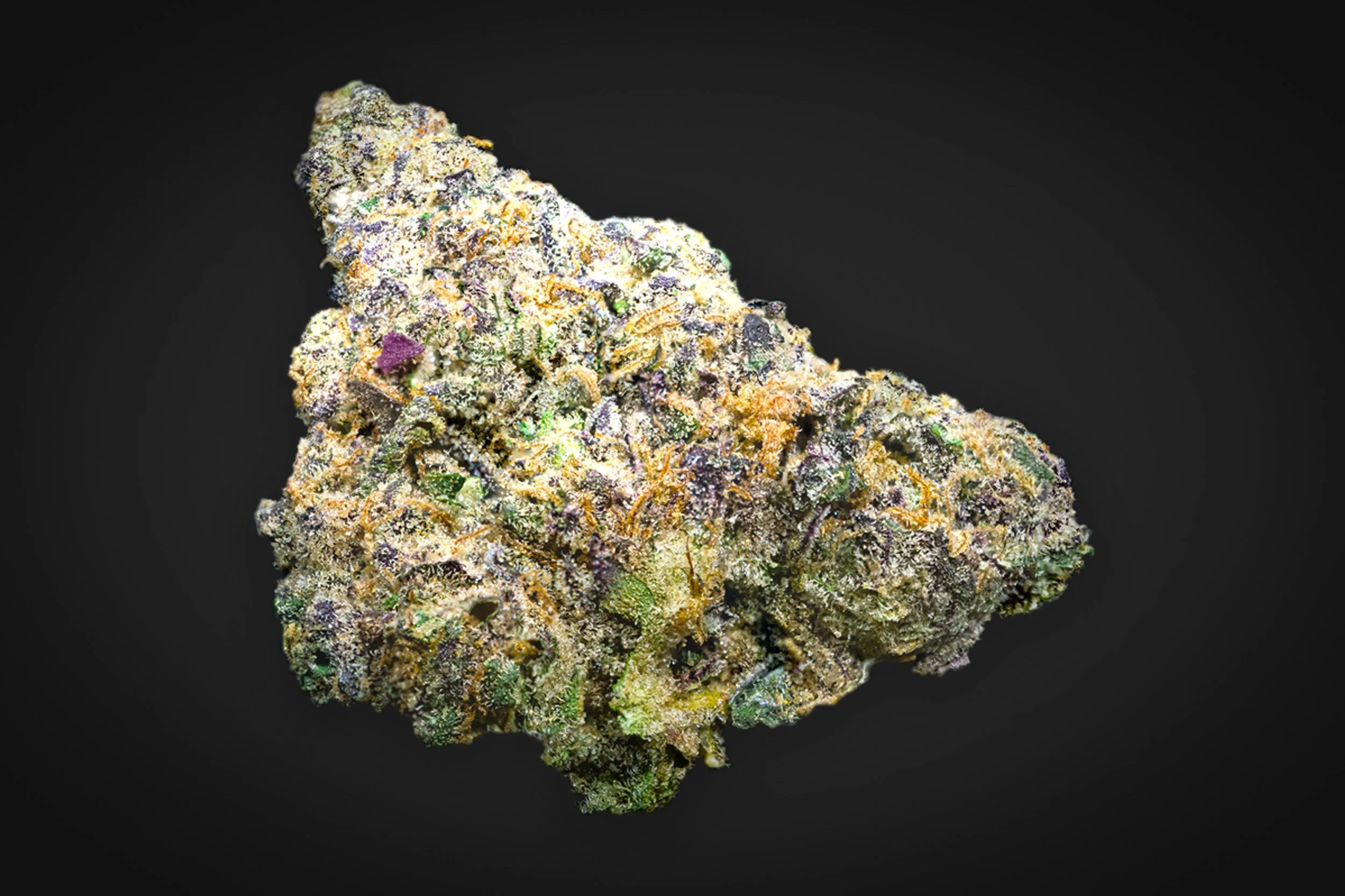 A macro shot of Glo 2 Unicorns Cannabis Flower