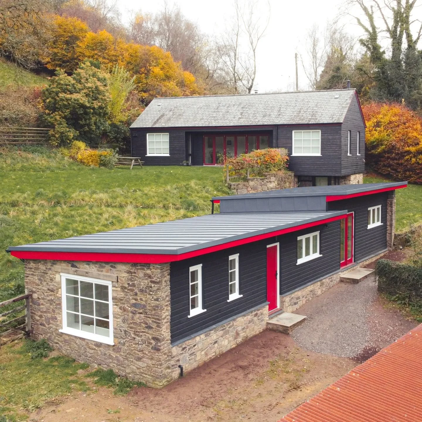 This small barn conversion project is now complete.

It creates a really useful home office, workshop and utility room as ancillary space to the main dwelling. 

Fantastic views down the valley.

The roof was kept at a low level to retain the views f