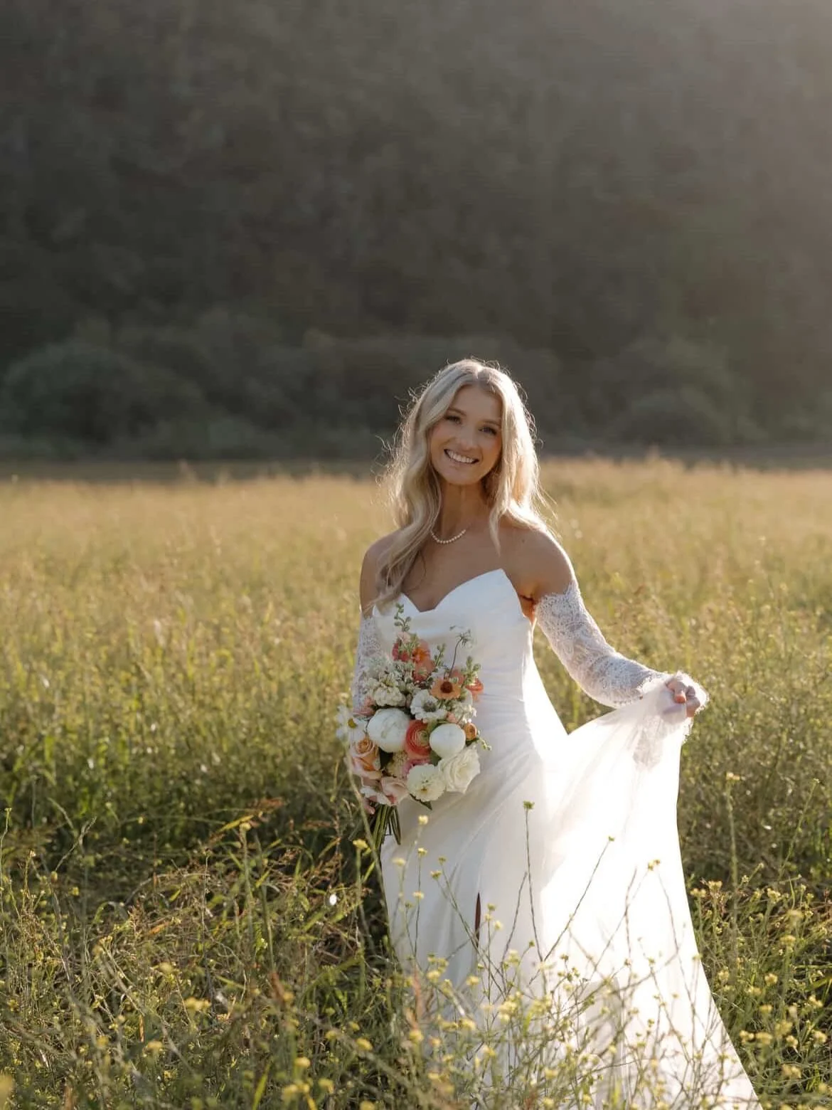 Stunning bride absolutely glowing on her big day with her tan from The Lounge! Congratulations, Ashley! You&rsquo;re just perfect!