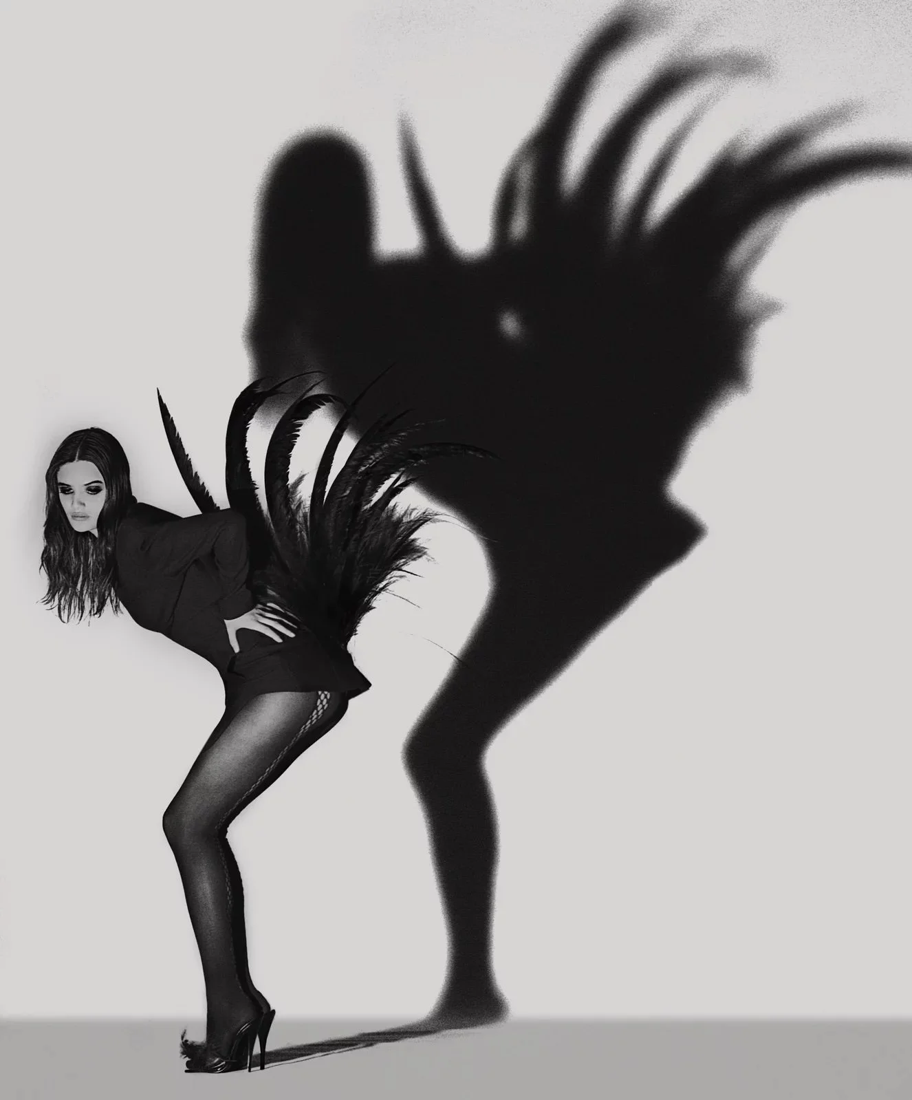 Albert Watson_Helen Christensen with Feathers, PAris, 1990.jpeg