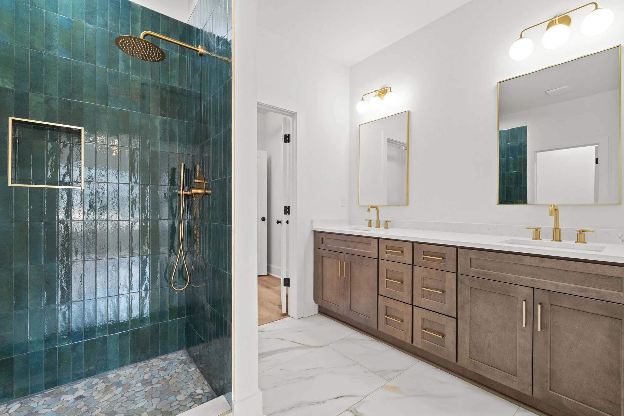 Which one of these bathroom designs by Frank Norment Homes is your favorite?