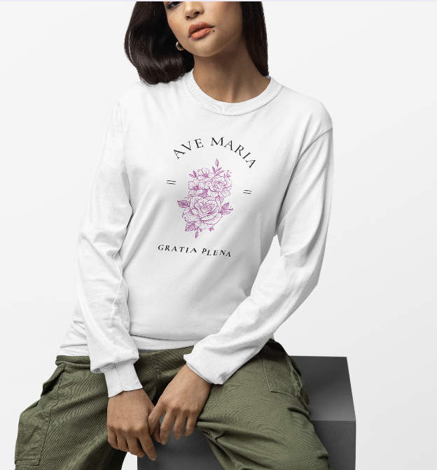 Woman wearing a white Ave Maria long-sleeve shirt