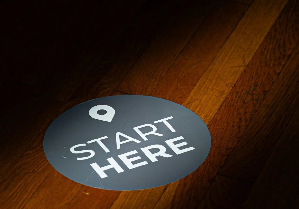 sign saying start here