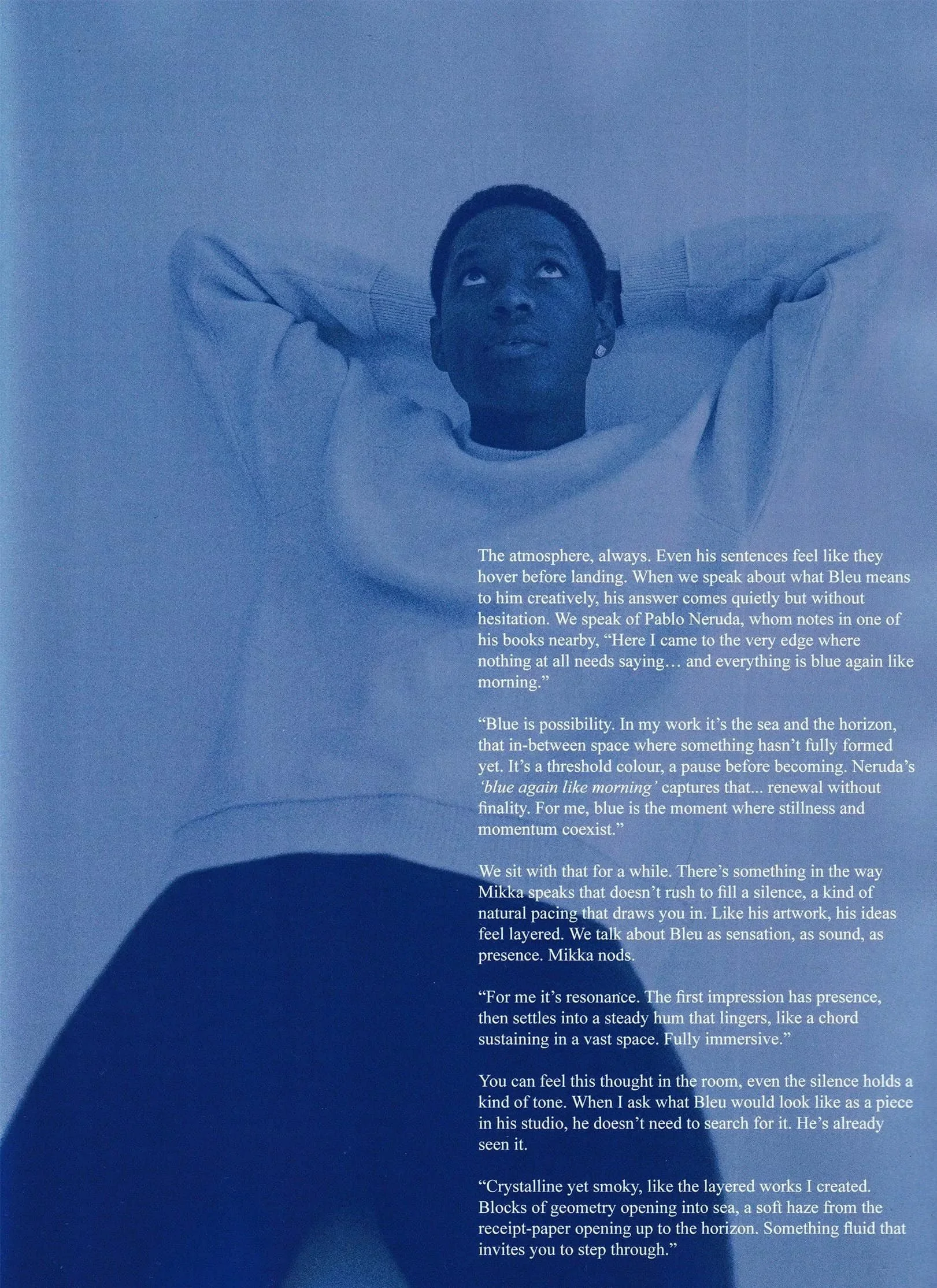 Mikka Byarugaba leaning back with hands behind their head, looking upward. There is a block of text on the right side of the image discussing the color blue and its significance, alongside themes of atmosphere, silence, and reflection.