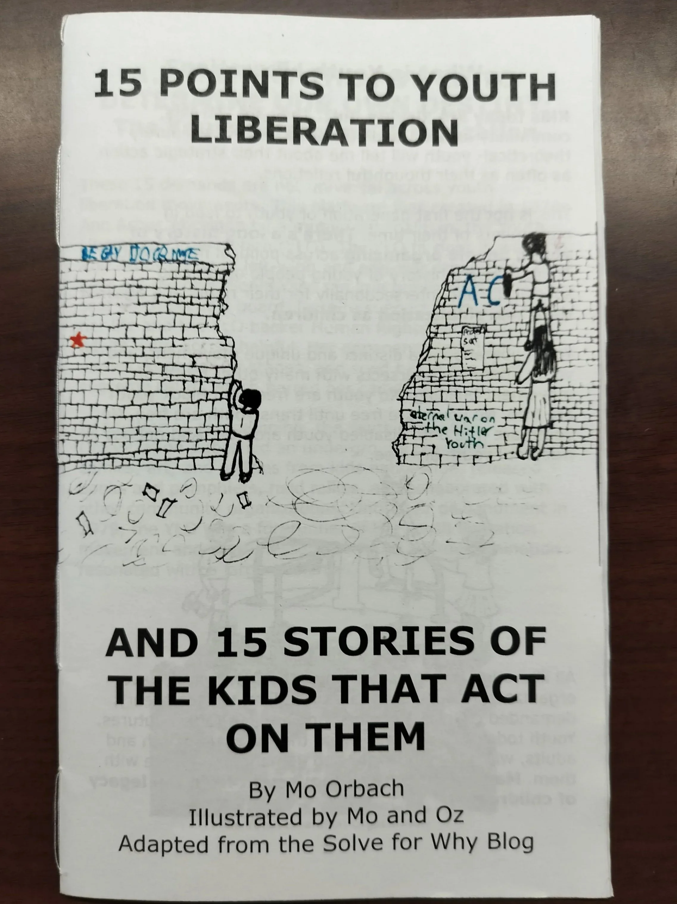 The front cover of the 15 points to youth liberation zine.