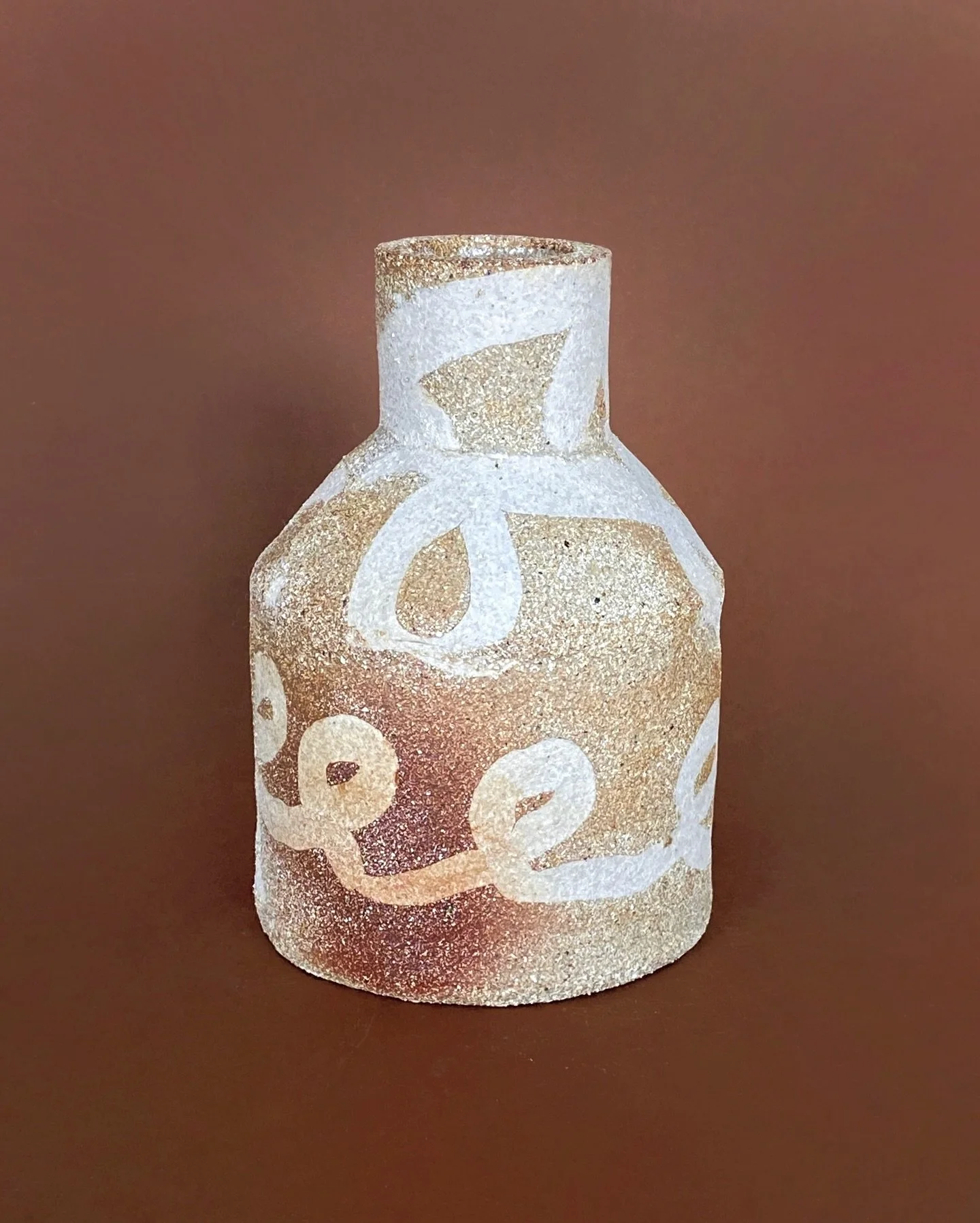 A toasty burnt bit on an inlay bud vase