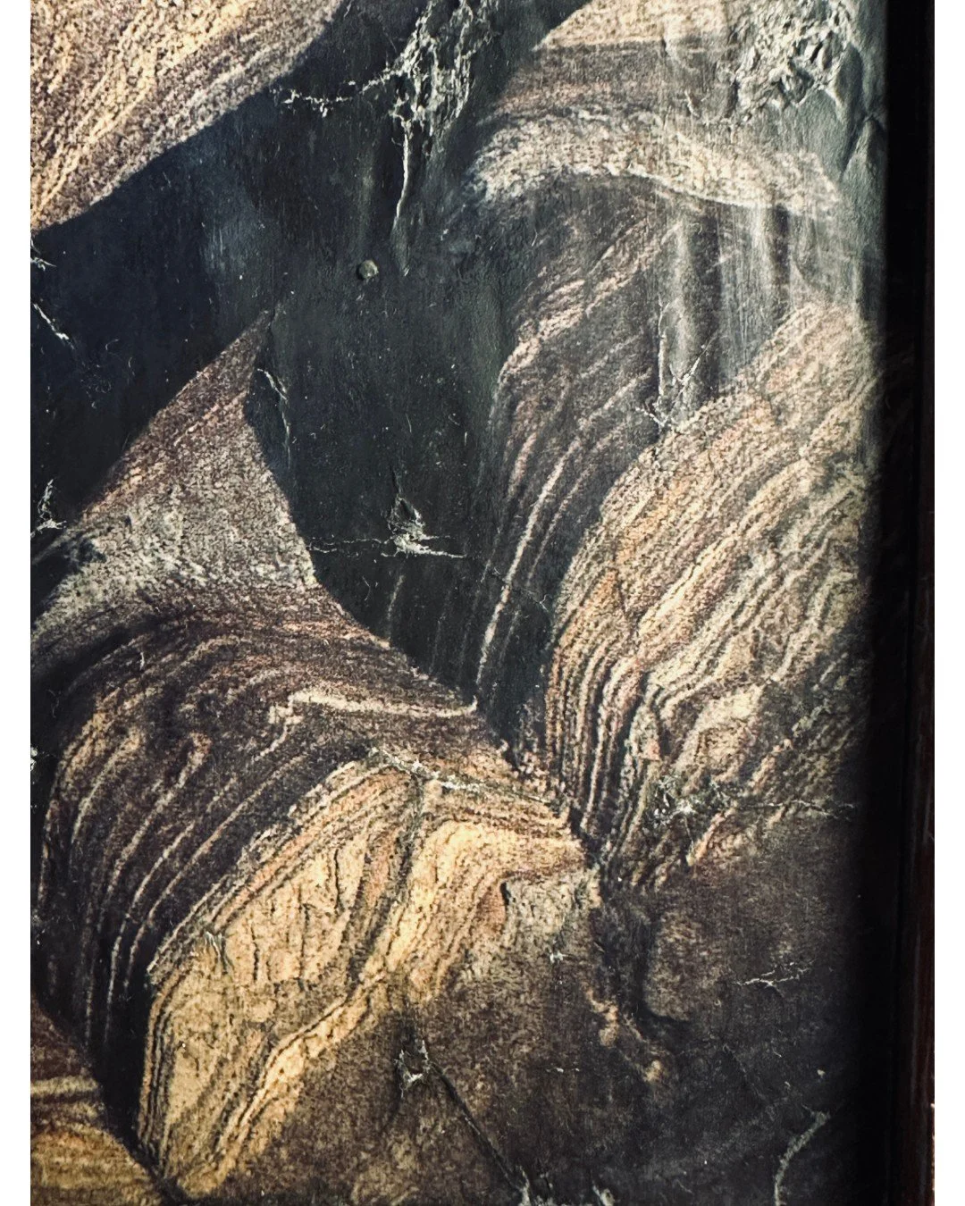 Close-up of geological striation imagery embedded within the background panel