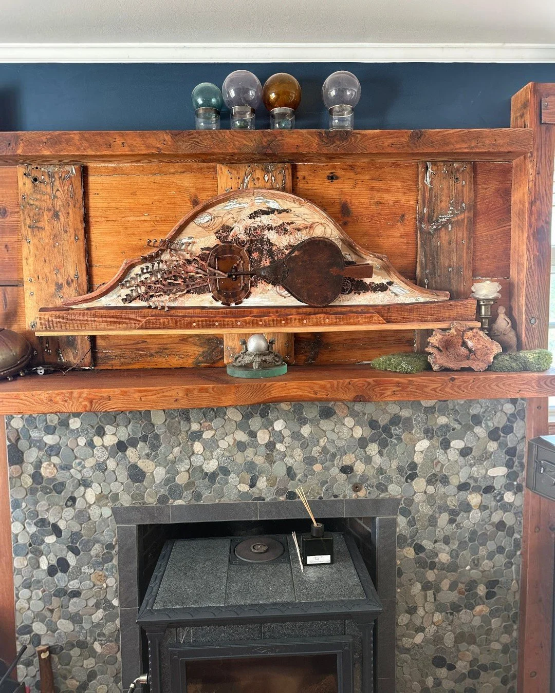 Incendiary assemblage with vintage fireplace bellows, typewriter keys and copper wire