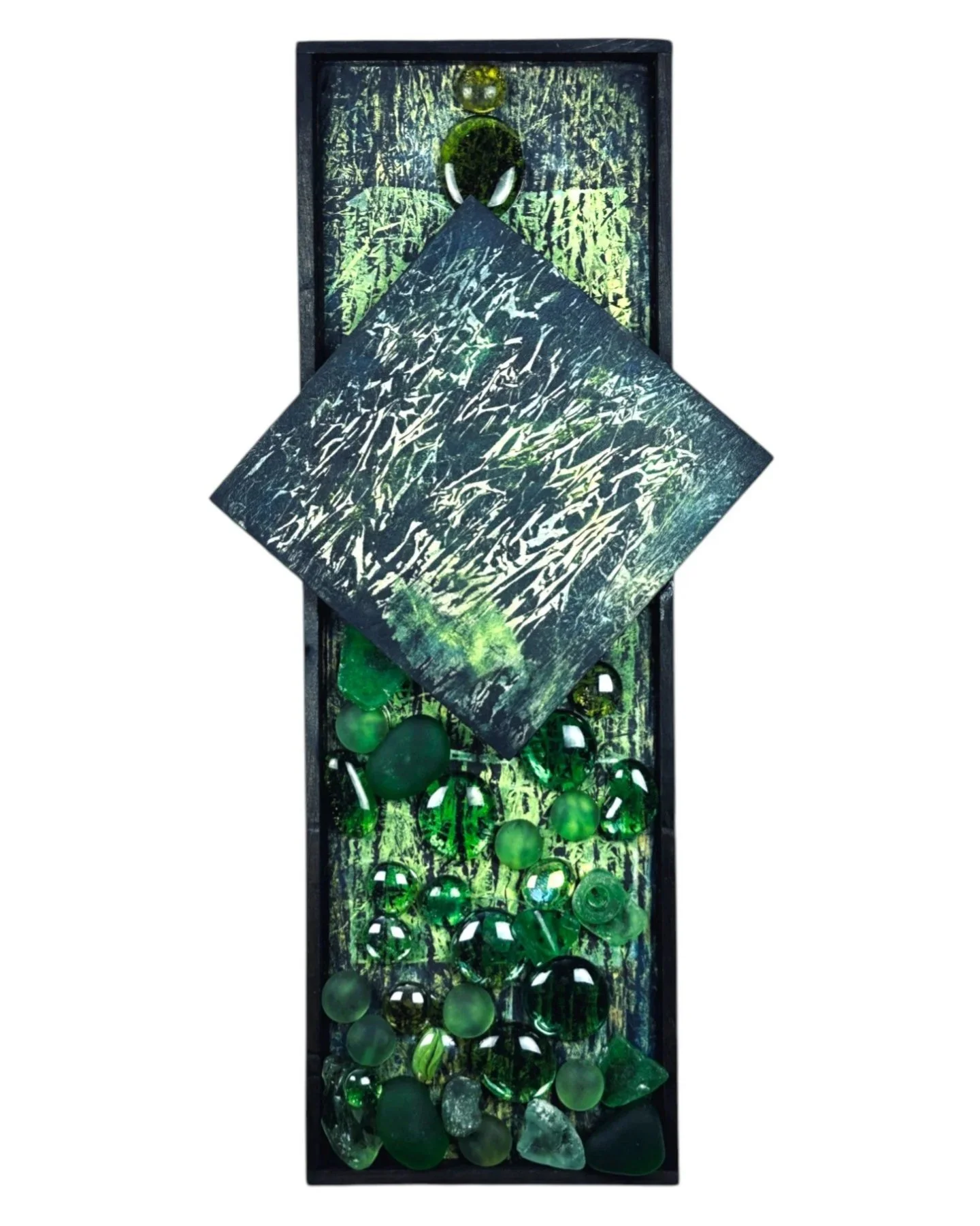 Front view of "Glass Canopy" assemblage artwork featuring layered abstract textures in green and black with embedded glass elements