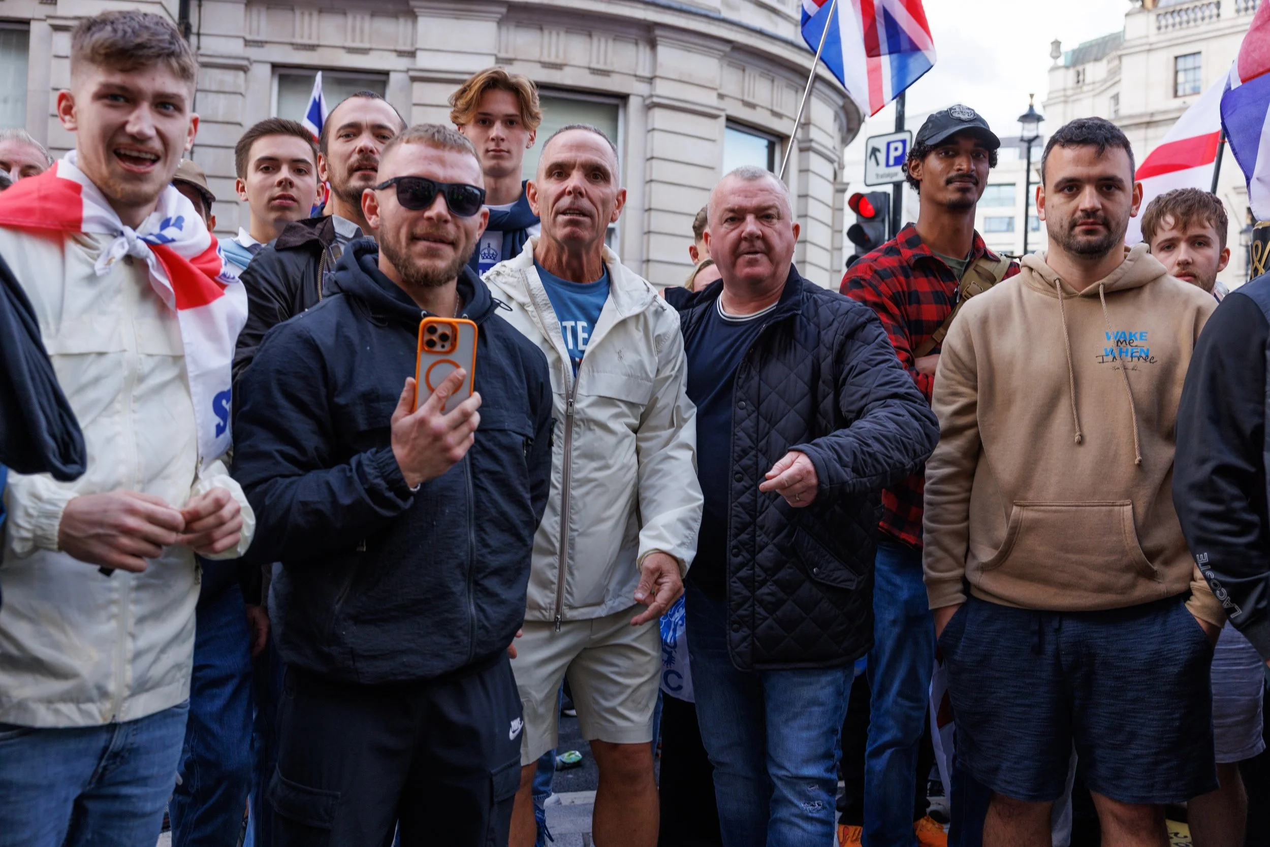 These men tried to wrestle my camera away at the Unite the Kingdom march