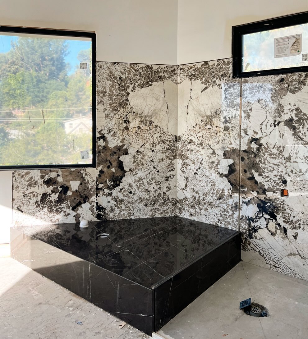Book matched shower and tub platform ✨ #wip