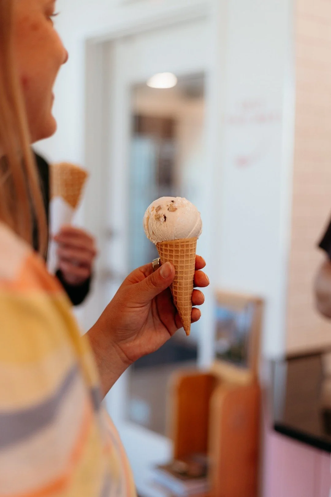 Inside these doors, you'll always be greeted with a neighborly smile, a waffle cone, and a scoop worth slowing down for 🍦