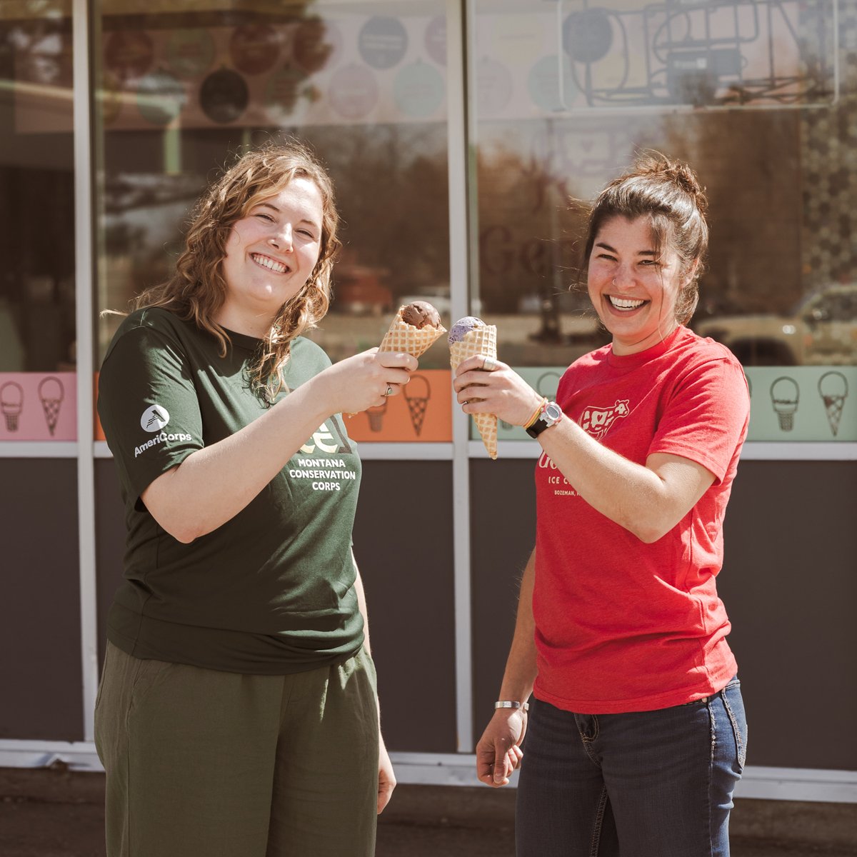 genuine ice cream owner and community member enjoying ice cream