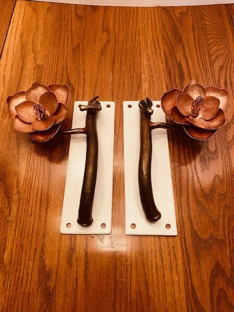 Magnolia branch with copper flowers