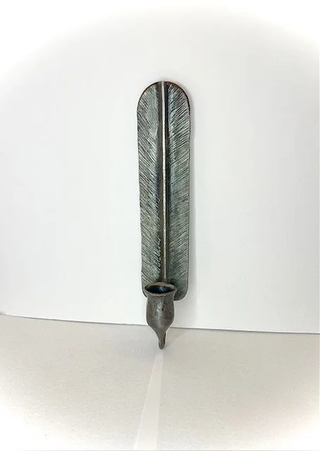 Hand forged feather wall sconce