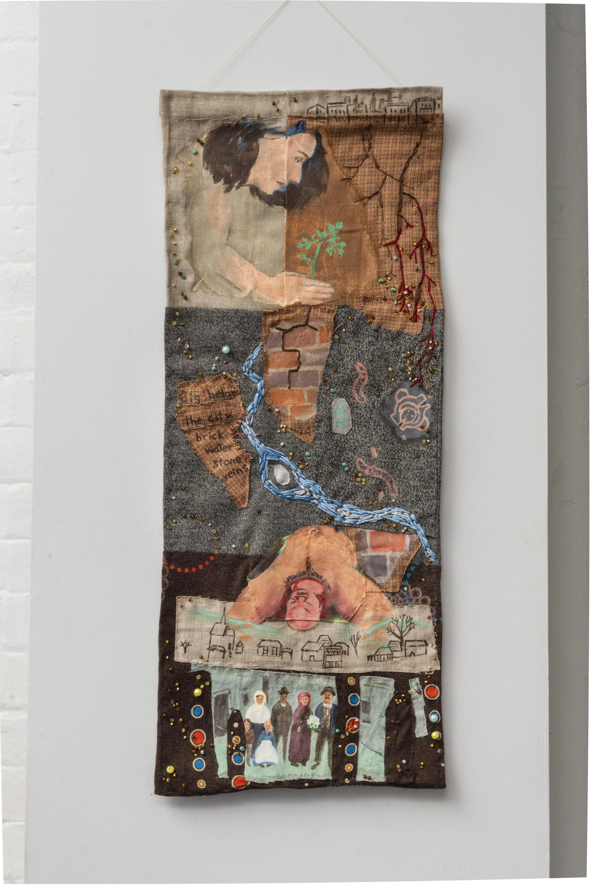 Katrina Slavik, 
Bricks under the asphalt, 2024, Acrylic, embroidery, and beading on repurposed fabric, 30”h x 12”w.