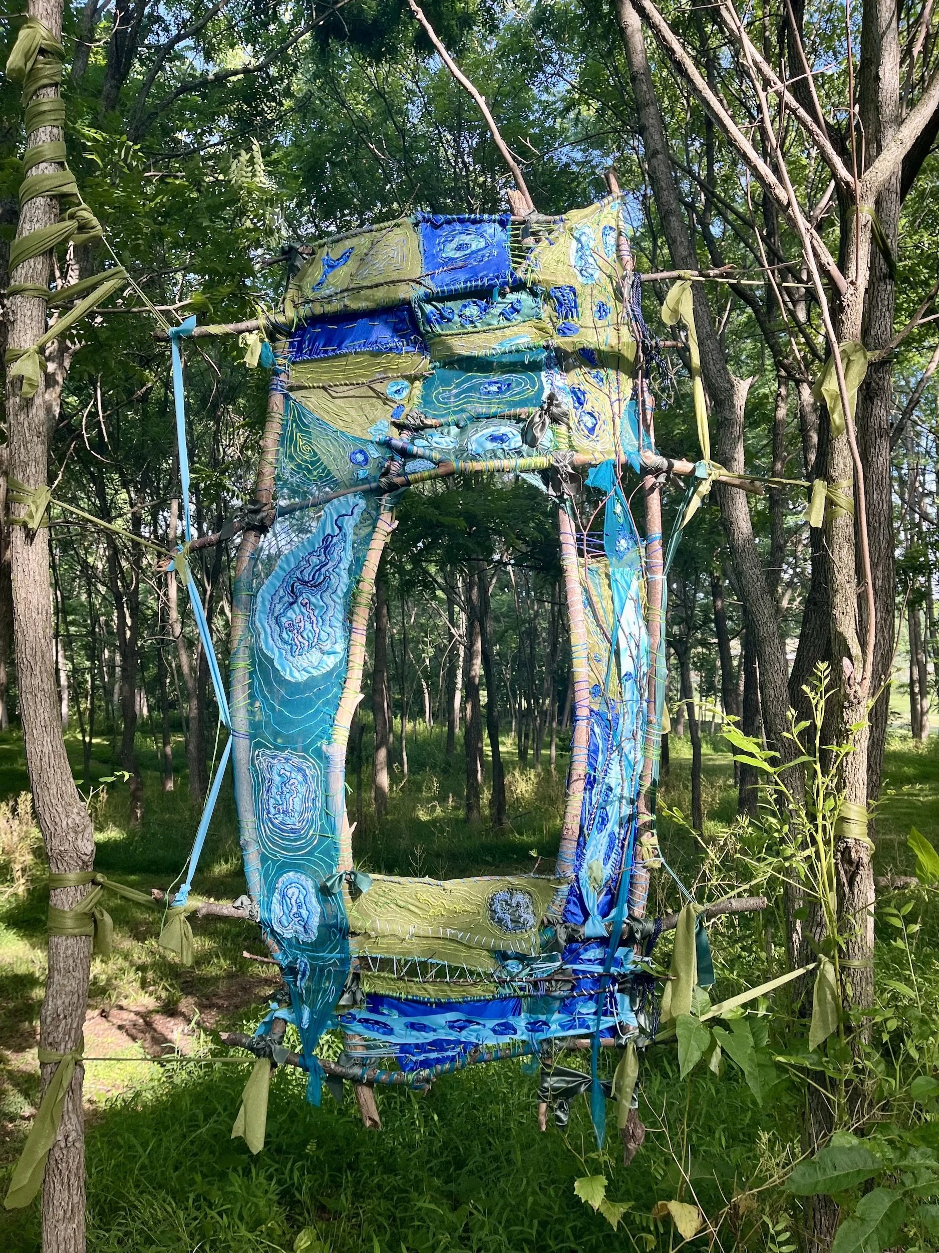 2026, repurposed textiles, embroidery, natural materials, 7 ft x 3.5 ft x 5 in

Installed at "Wishing Well," Mother-In-Law's Gallery in Germantown, NY. Curated by Jessica Hargreaves & Jacob Rhodes, Field Projects.