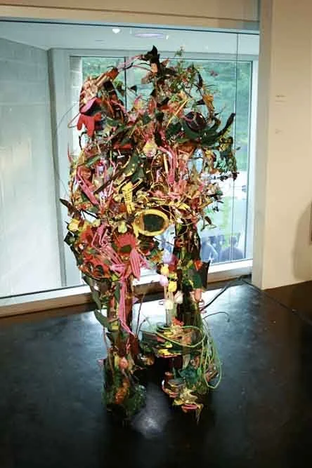 The Garden, wood, wire, string, branches, post consumer materials, acrylic paint, electric lights, 70"h 40"w 44"d, 2011, Tang Museum, NY.