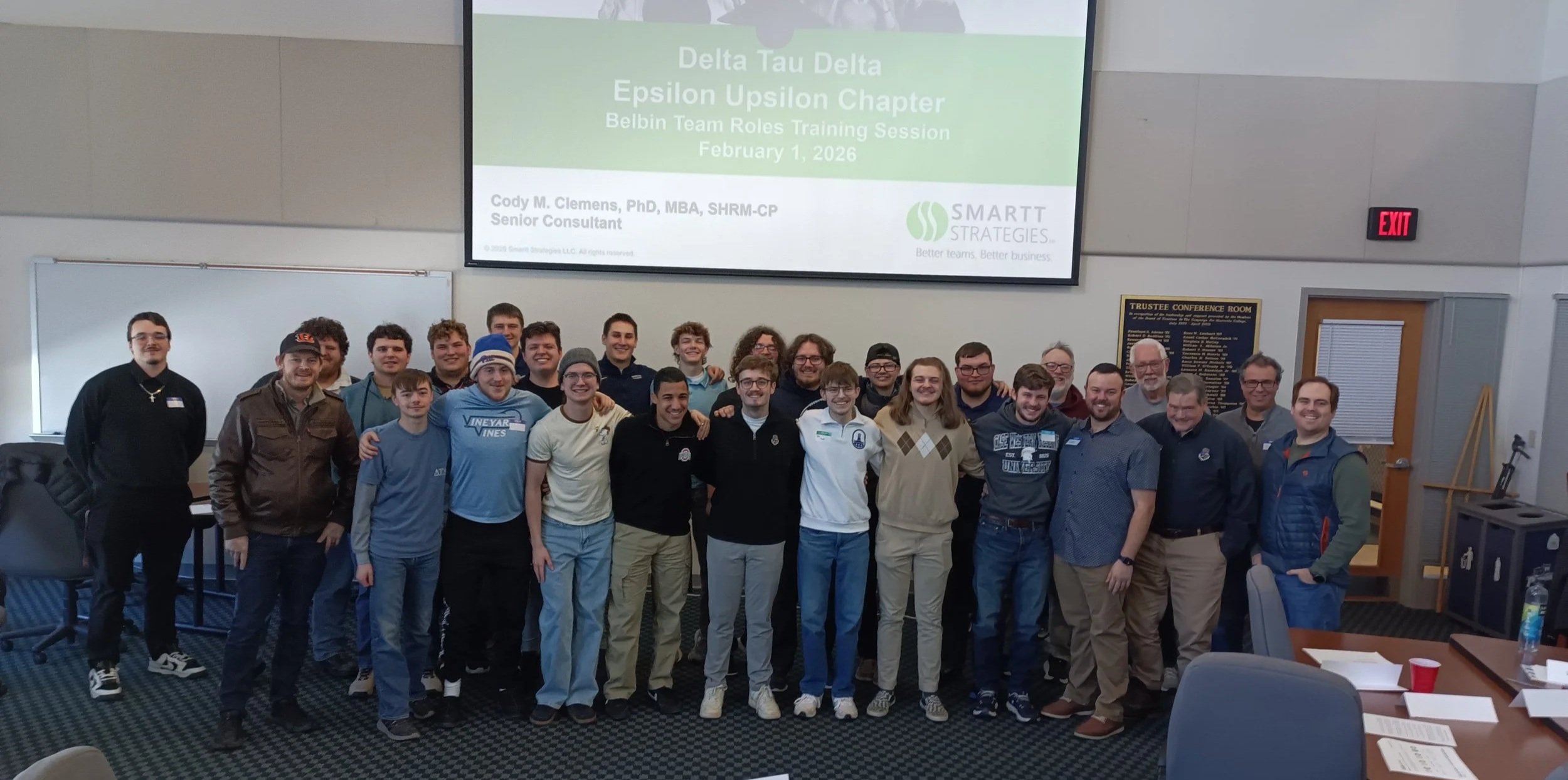 Epsilon Upsilon Chapter and their alumni mentors all pose for a picture following the Belbin training.