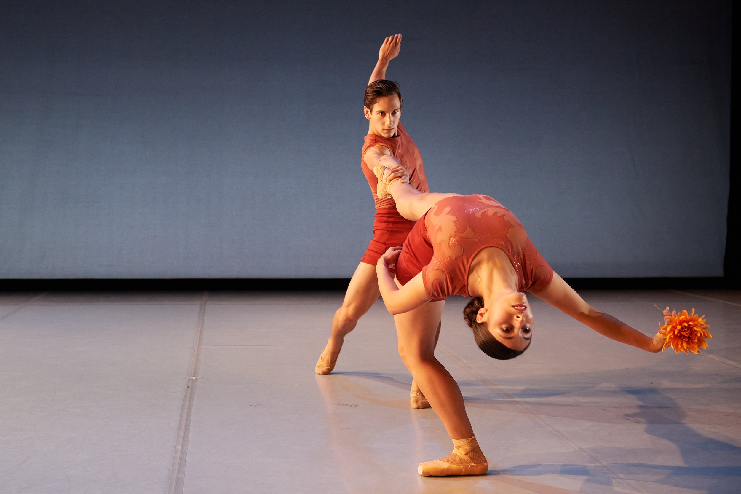 Photo by David DeSilva. Imagery dancers Isabella Velasquez & Anthony Cannarella in "By Any Other Name" by Amy Seiwert (2021). Costumes by Susan Roemer, S-Curve Apparel & Design, Lighting by Jim French.