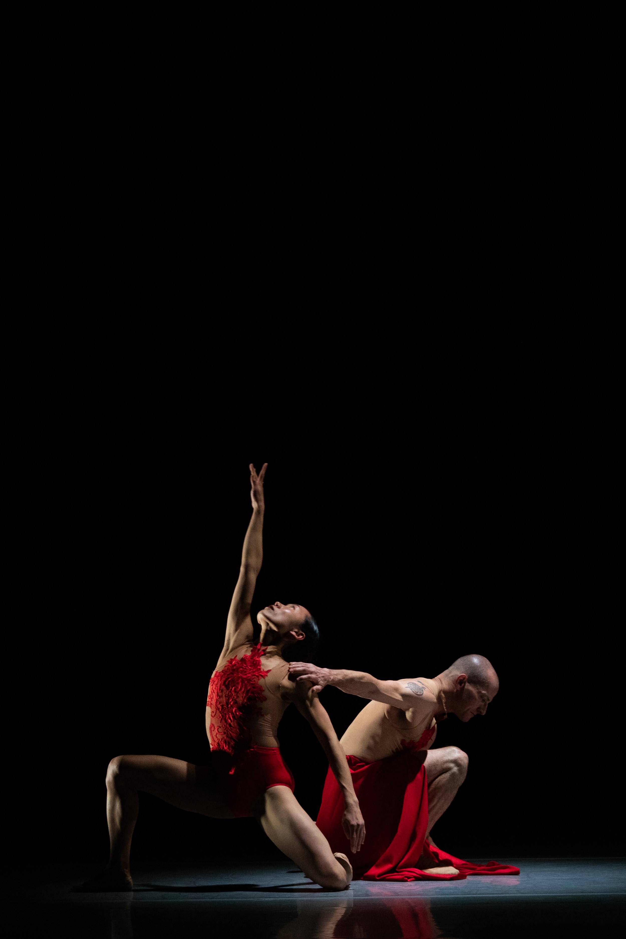 Photo: ODC dancers in Amy Seiwert's "Witness" (2023), taken by Robbie Sweeny/ODC, costumes by Jamielyn Duggan, lighting by Alexander V. Nichols