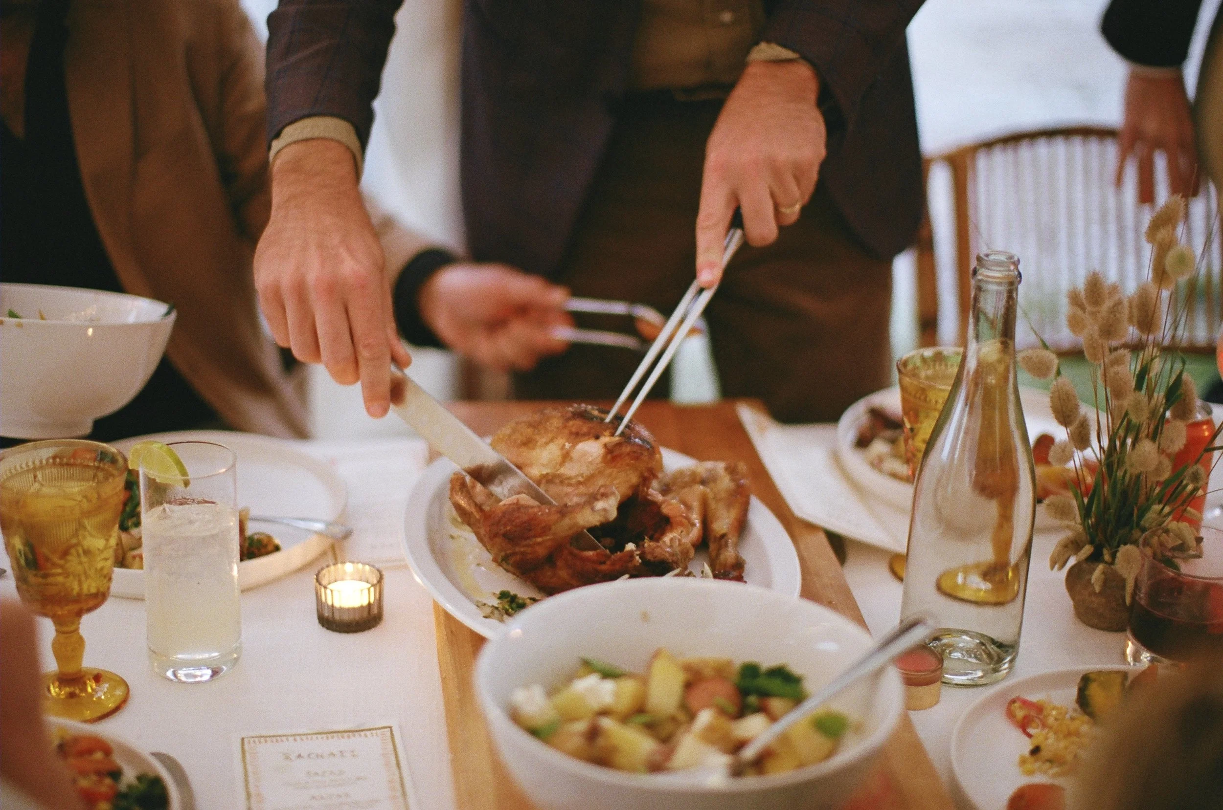 farm to table set up cutting into a chicken