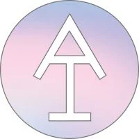 Stylized letter A over T in gradient circle