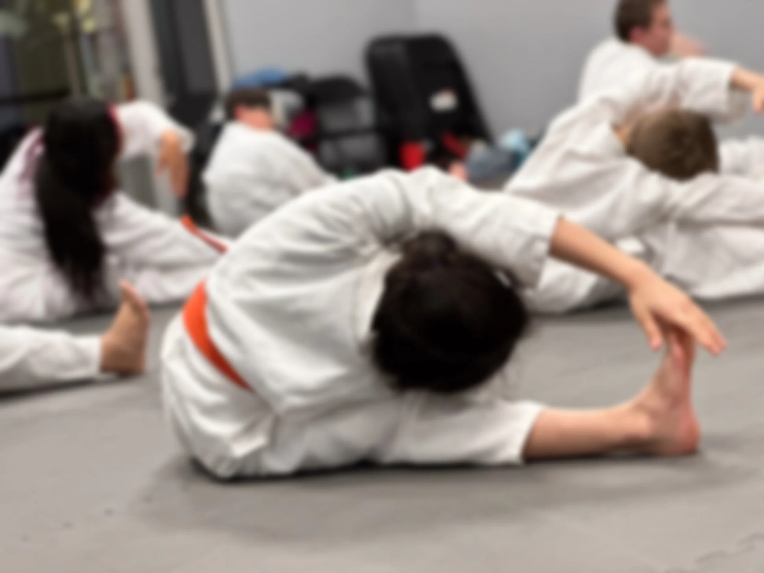 student stretching for class