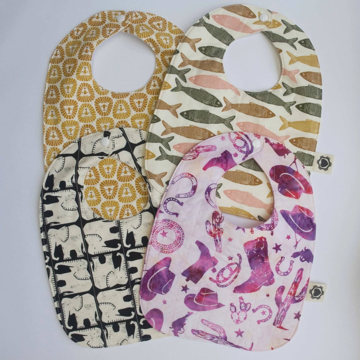 So excited to show off our newest product: baby bibs! 

100% cotton and machine washable for all your messy, baby-related needs

We have it on good authority from one baby and his parents they work great! 

Available now on our website, with more pri