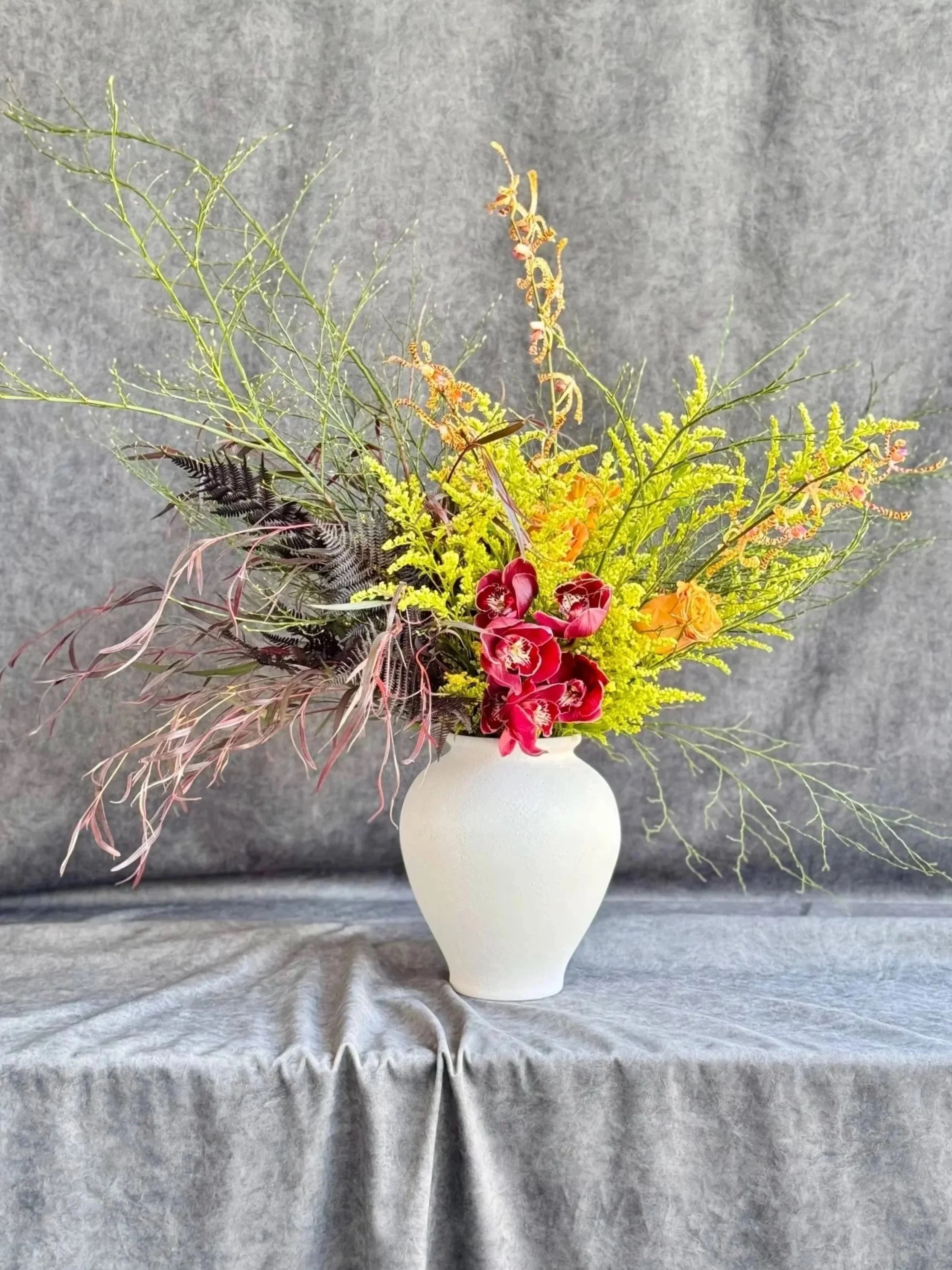 Luxury residential flowers featuring expressive botanical movement and seasonal color in Raleigh.