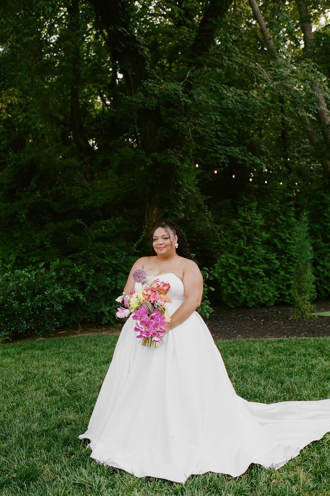 Close-up of an editorial wedding bouquet showcasing asymmetrical floral design, layered botanical textures, and contemporary bridal flowers.