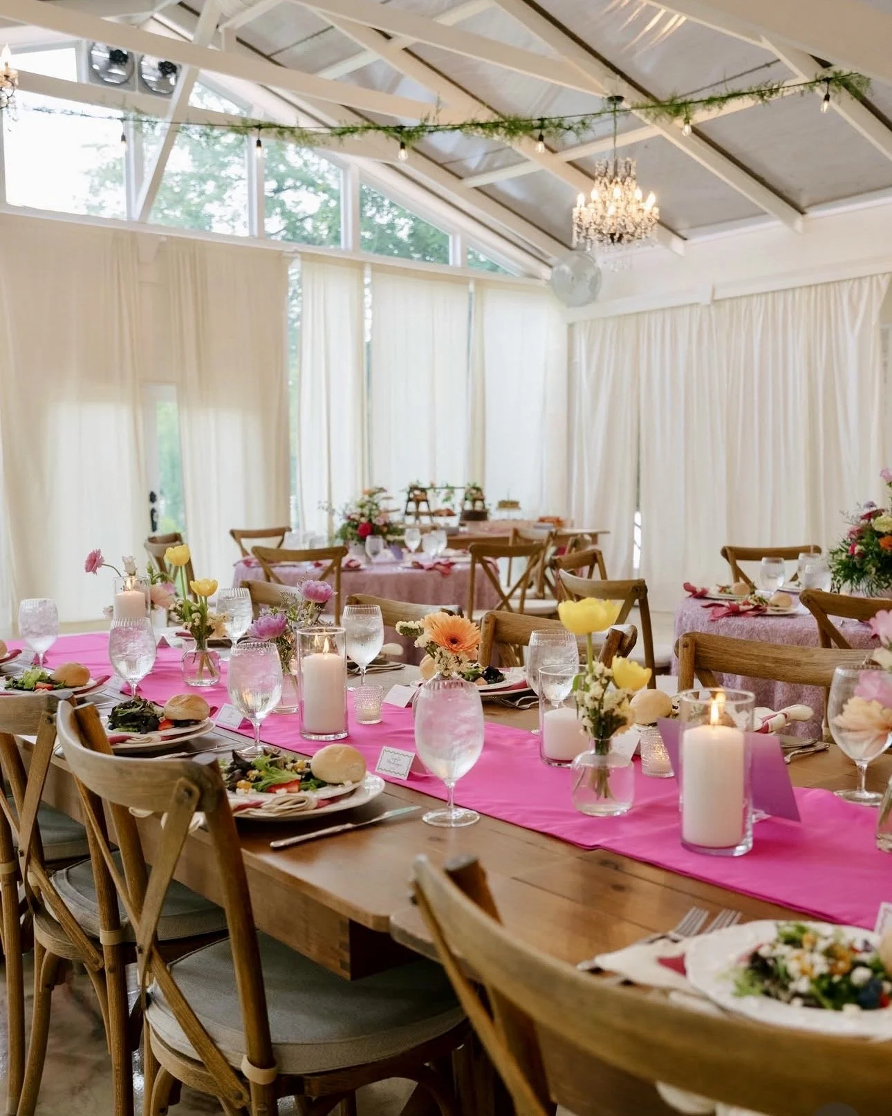 Elegant wedding reception tablescape featuring romantic floral centerpieces, curated place settings, and thoughtfully designed flowers creating an elevated guest experience in Lillington, NC