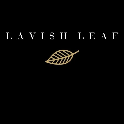 Text reading 'LAVISH LEAF' with a gold leaf icon below it on a black background.