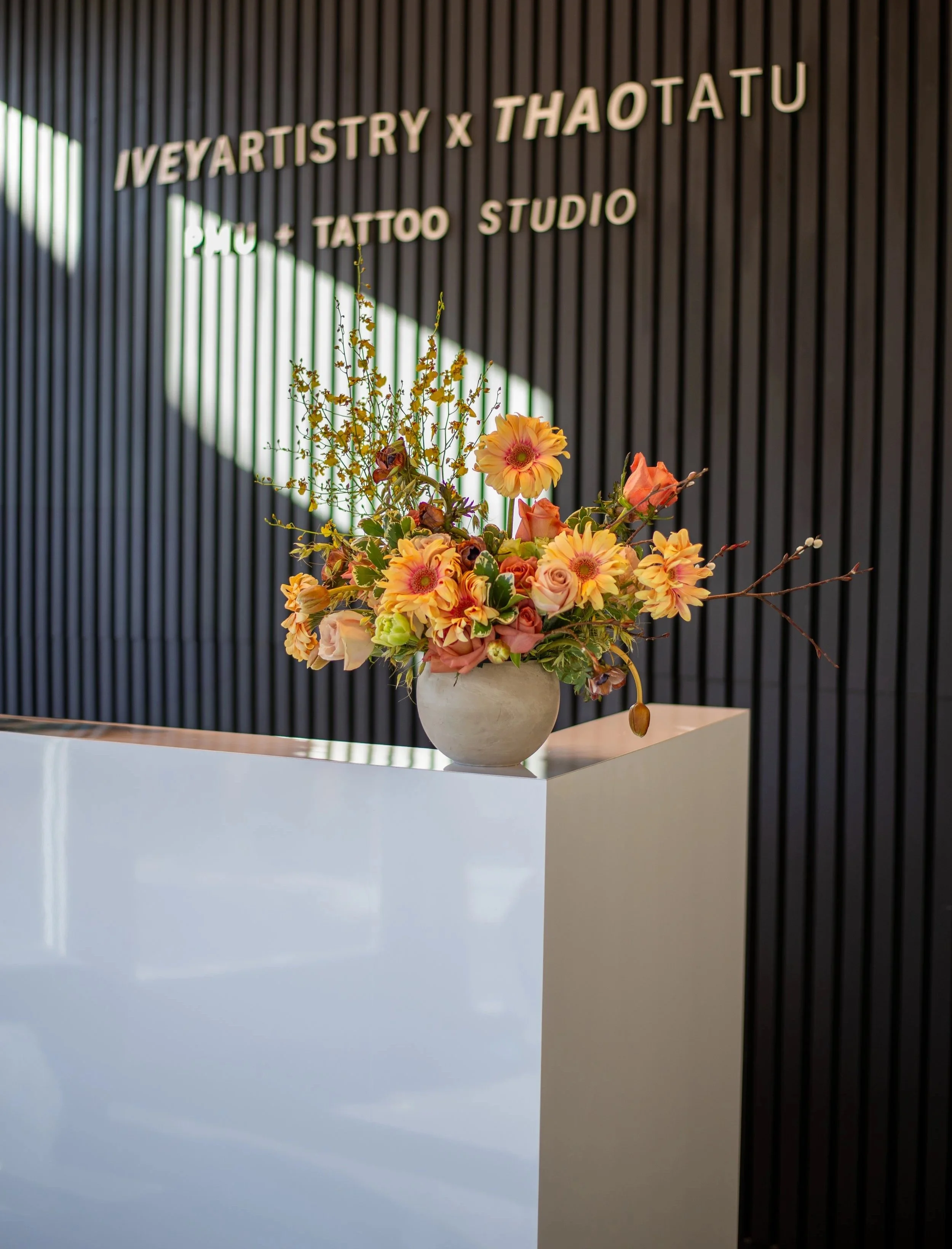 Contemporary floral design displayed in studio lobby in Raleigh, North Carolina. 