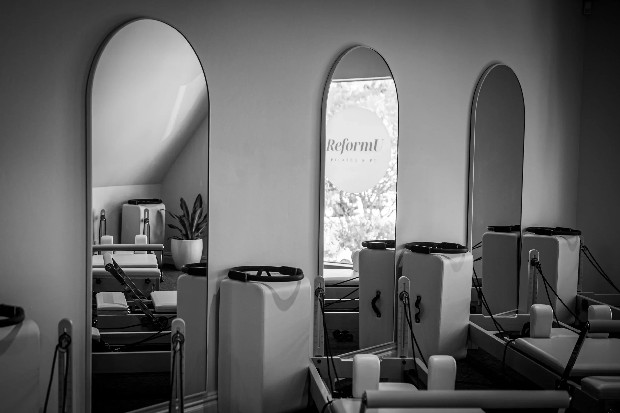 Pilates reformer class Wahroonga studio in black and white