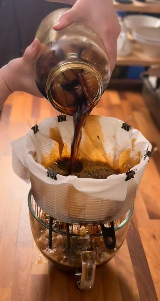 Straining final sauce