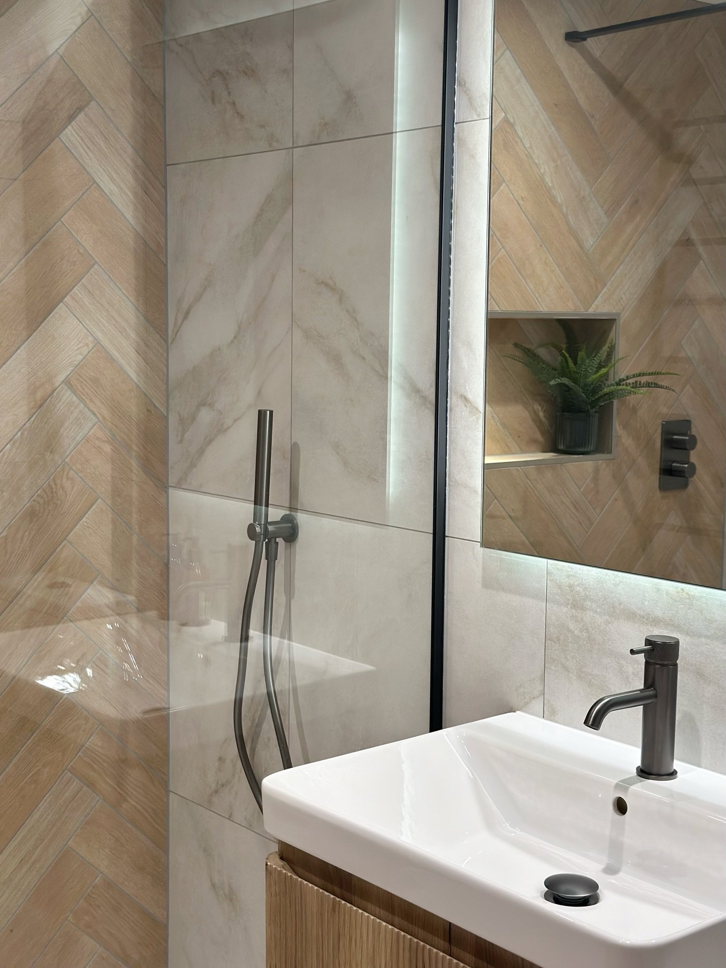 The contrast of marble &amp; warm wood is a design concept we will never be over, finished with rich anthracite brassware to accentuate the ashy undertones, this bathroom has been finished in excellence 💭✨

#bathroomdesign #bathroom #bathroominspo #