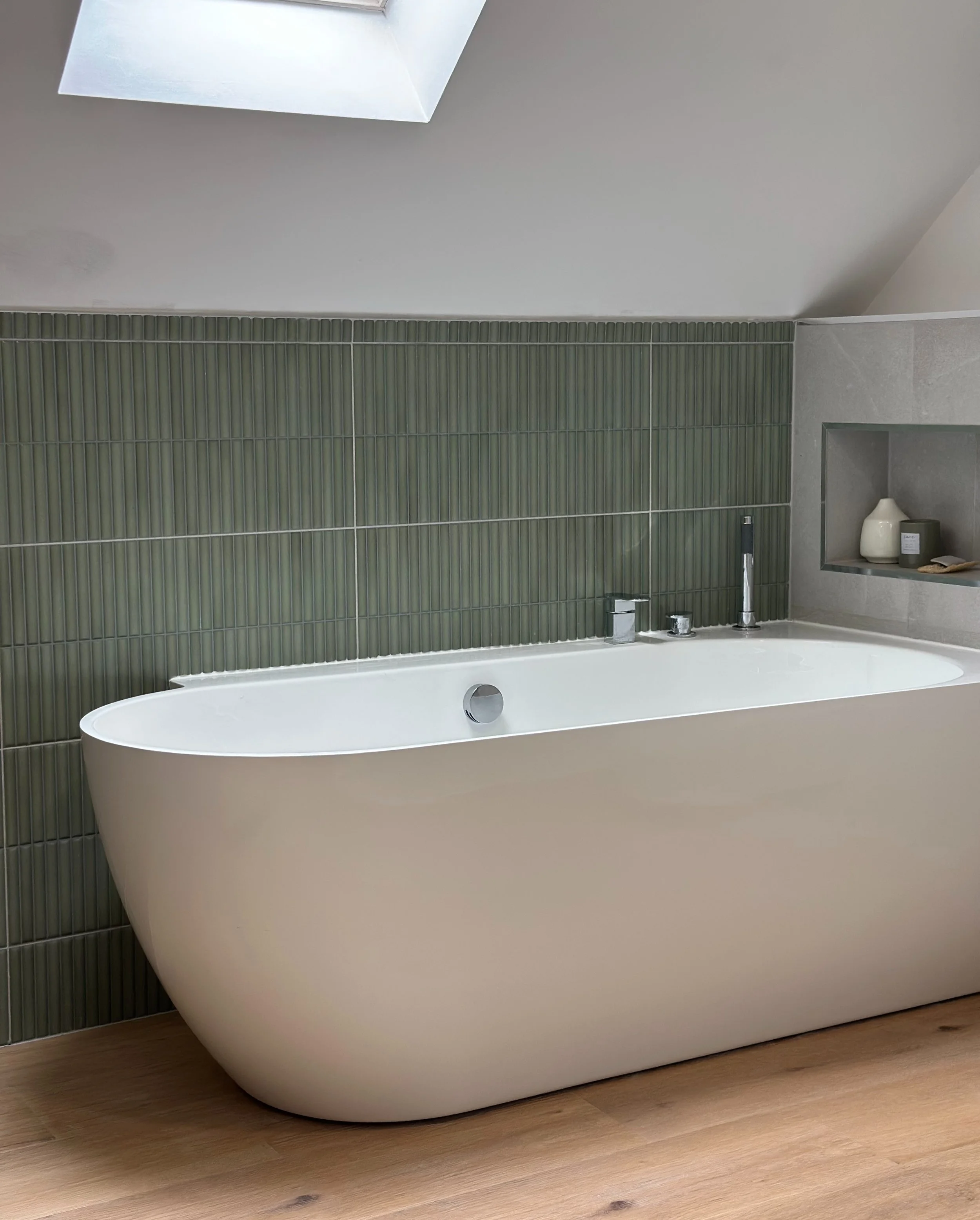 Our clients brief was simple, to create a space that was fresh and offered a little quiet at the start and end of each day. Soft sage fluted tiles and warm natural textures work seamlessly together, each carefully chosen to complement the next and br