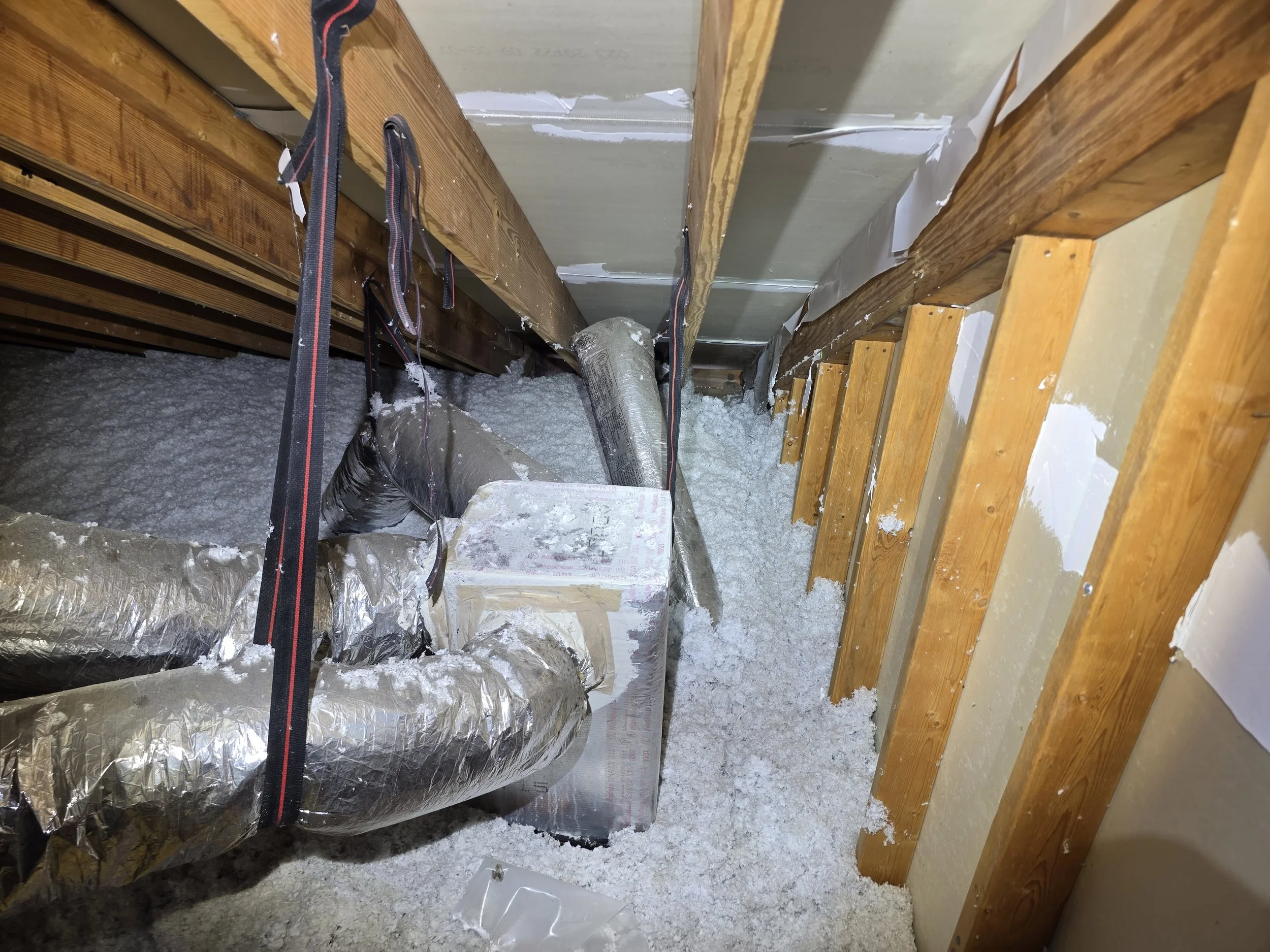 Attic inspection during a full home inspection in Navarre, FL by J. Gregory Home Inspections