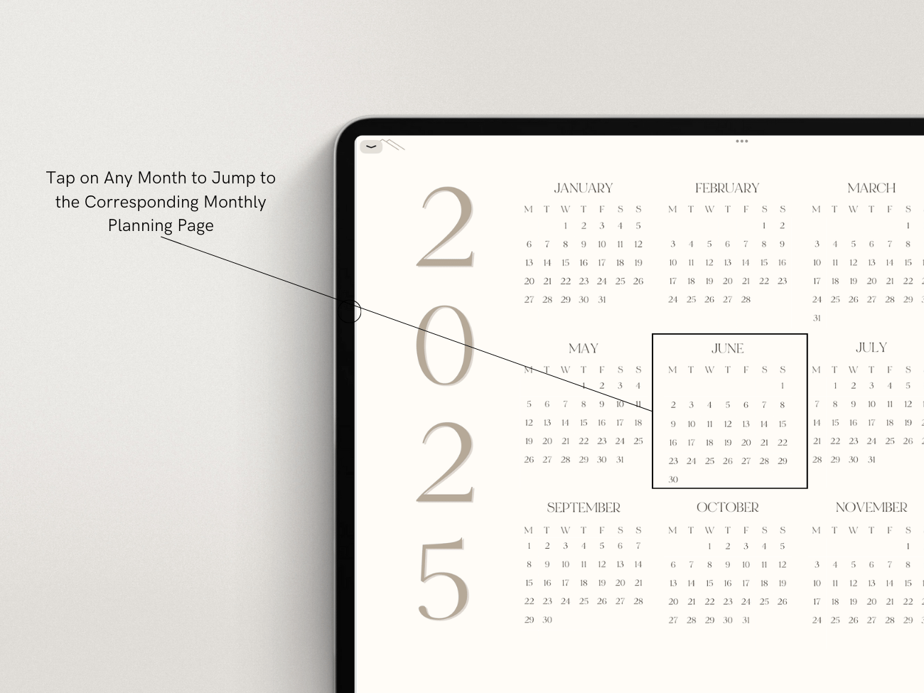 Digital calendar displaying January to November 2025 on a computer screen with a instruction to tap any month to view the corresponding monthly planning page.