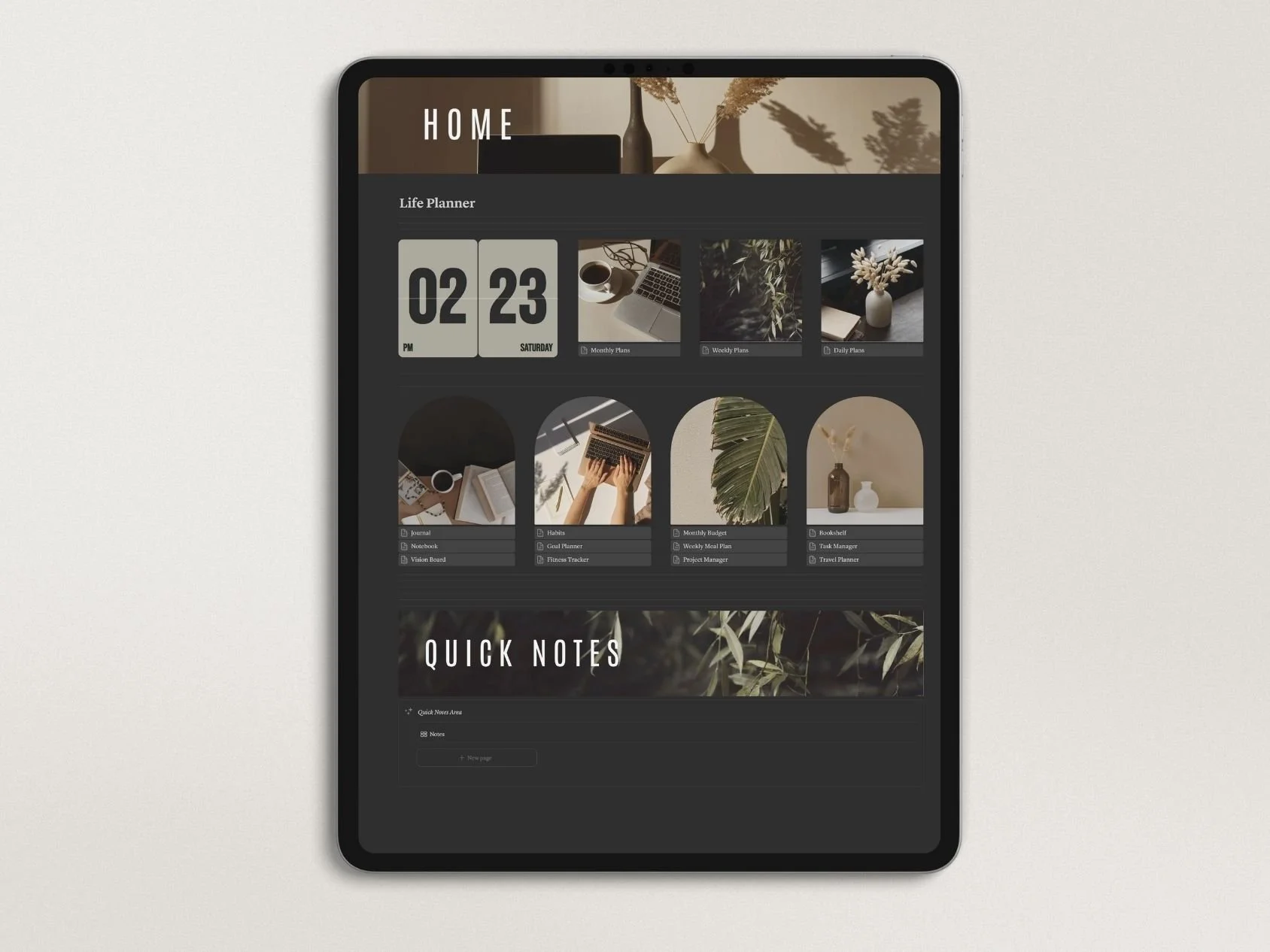 A tablet displaying a home screen with a dark-themed planner app, calendar, and notes section