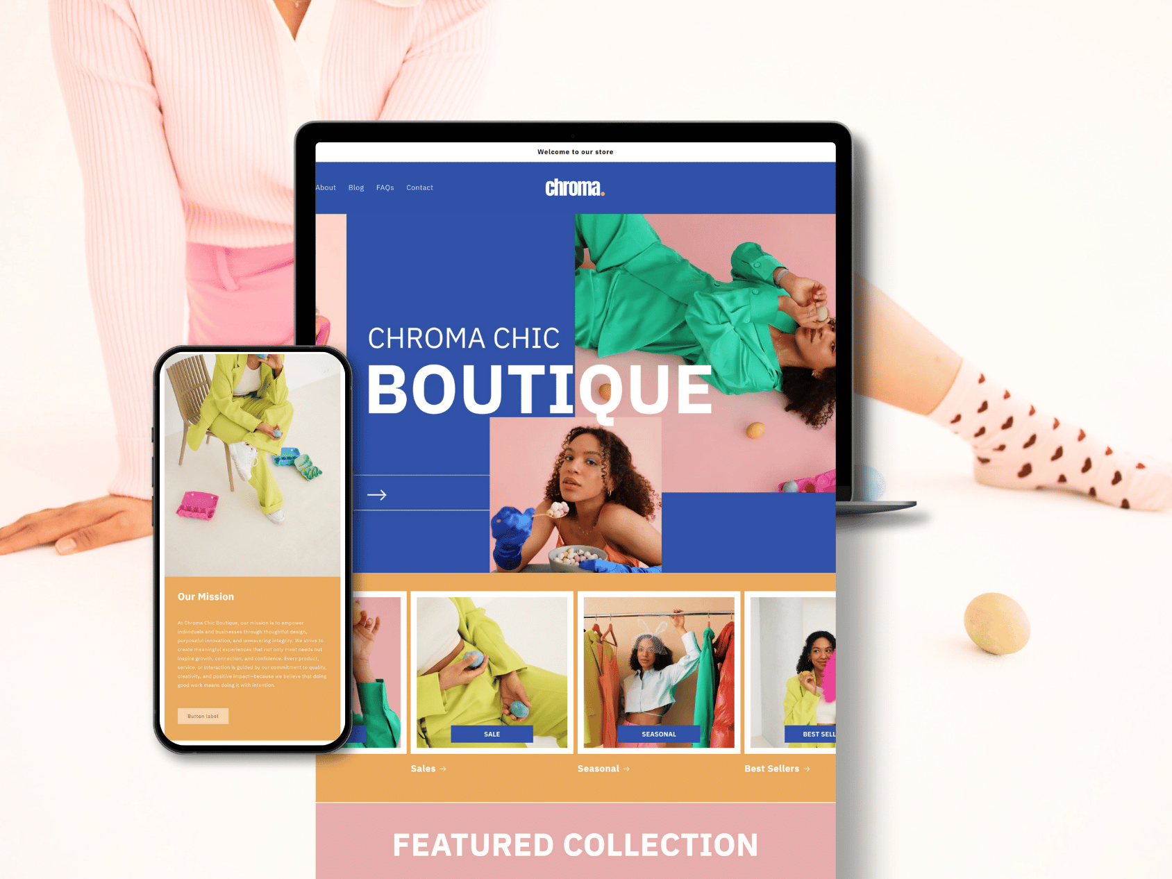 A person wearing pink and white clothing sitting on a white surface with a laptop and a smartphone displaying a boutique website for Chroma Chic, featuring models in colorful outfits, with some small colored objects scattered around.