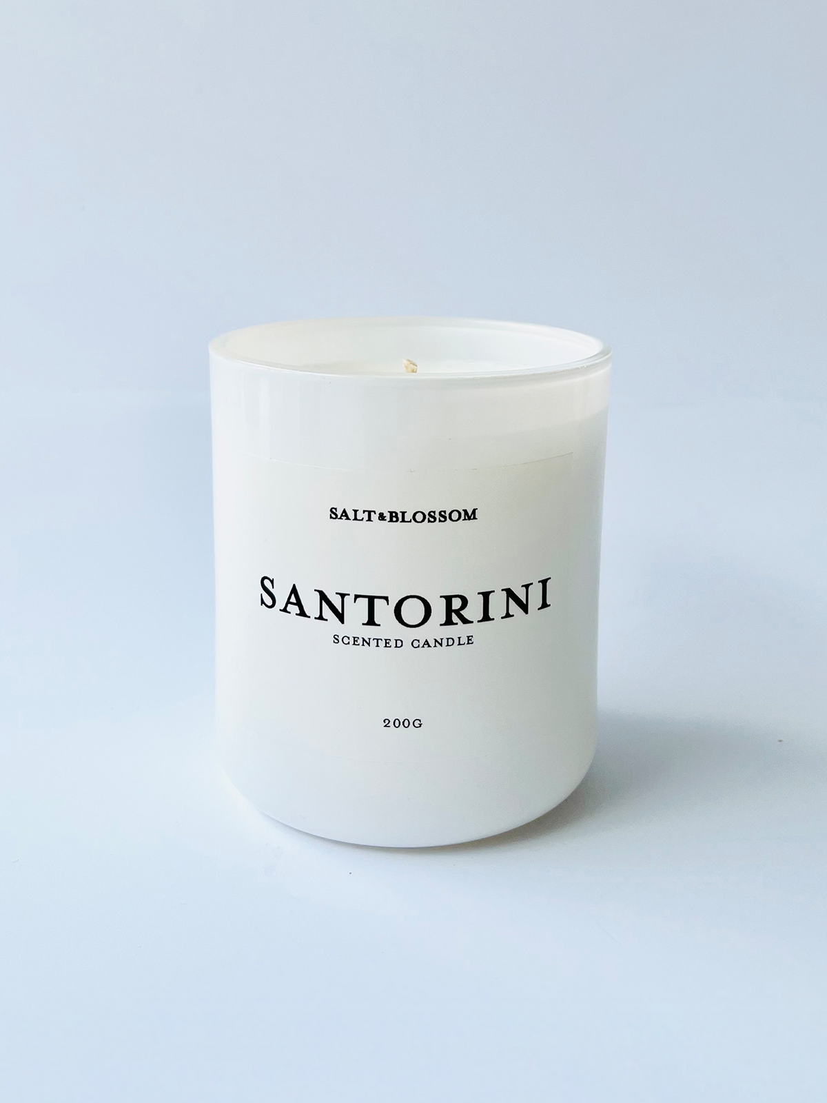Santorini candle in white jar